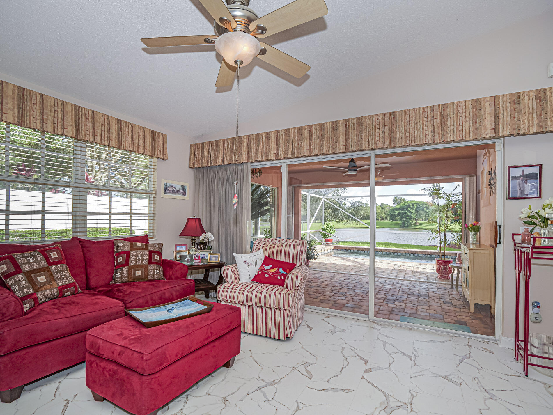 Sliders to the Pool and Screened Lanai