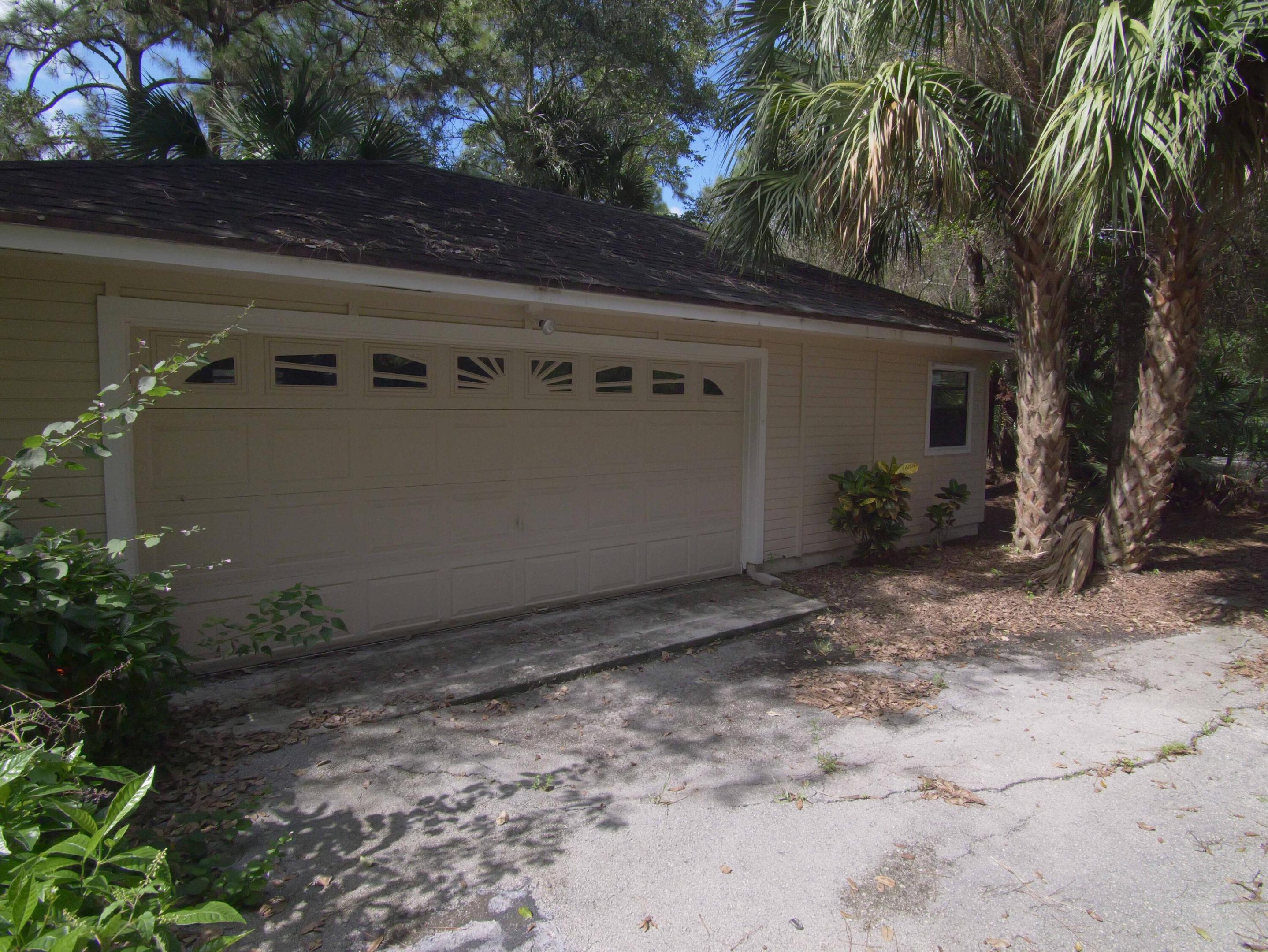 Separate two car+ garage & workshop -could be converted