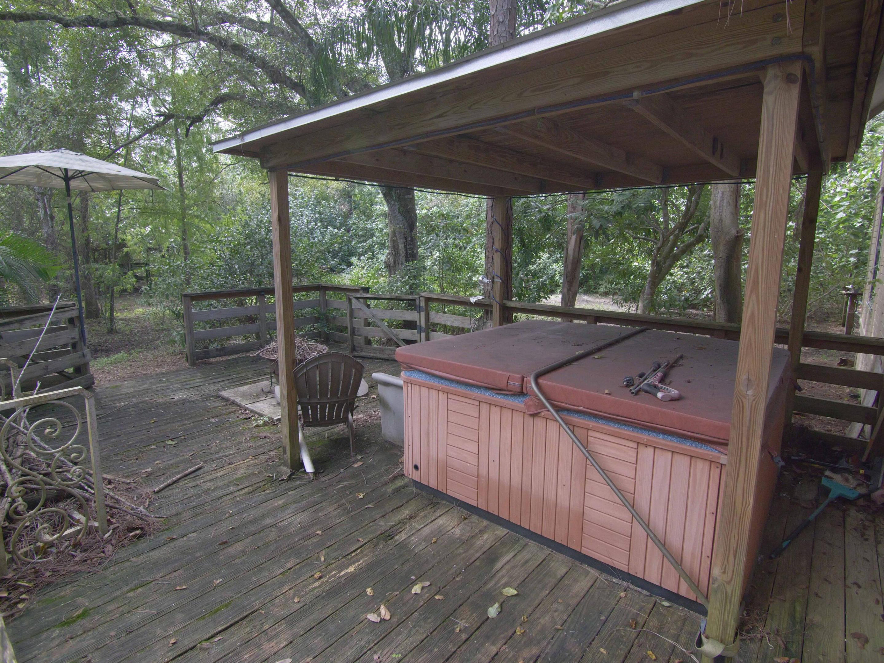 Hot Tub and back Deck South Side of home