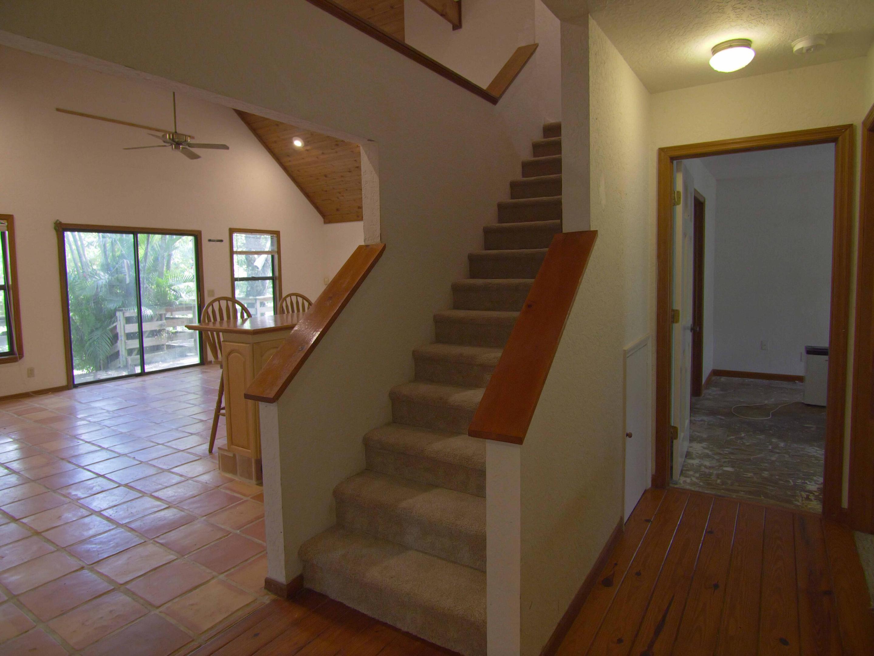 Great Room & Downstairs Primary BDR, leading upstairs
