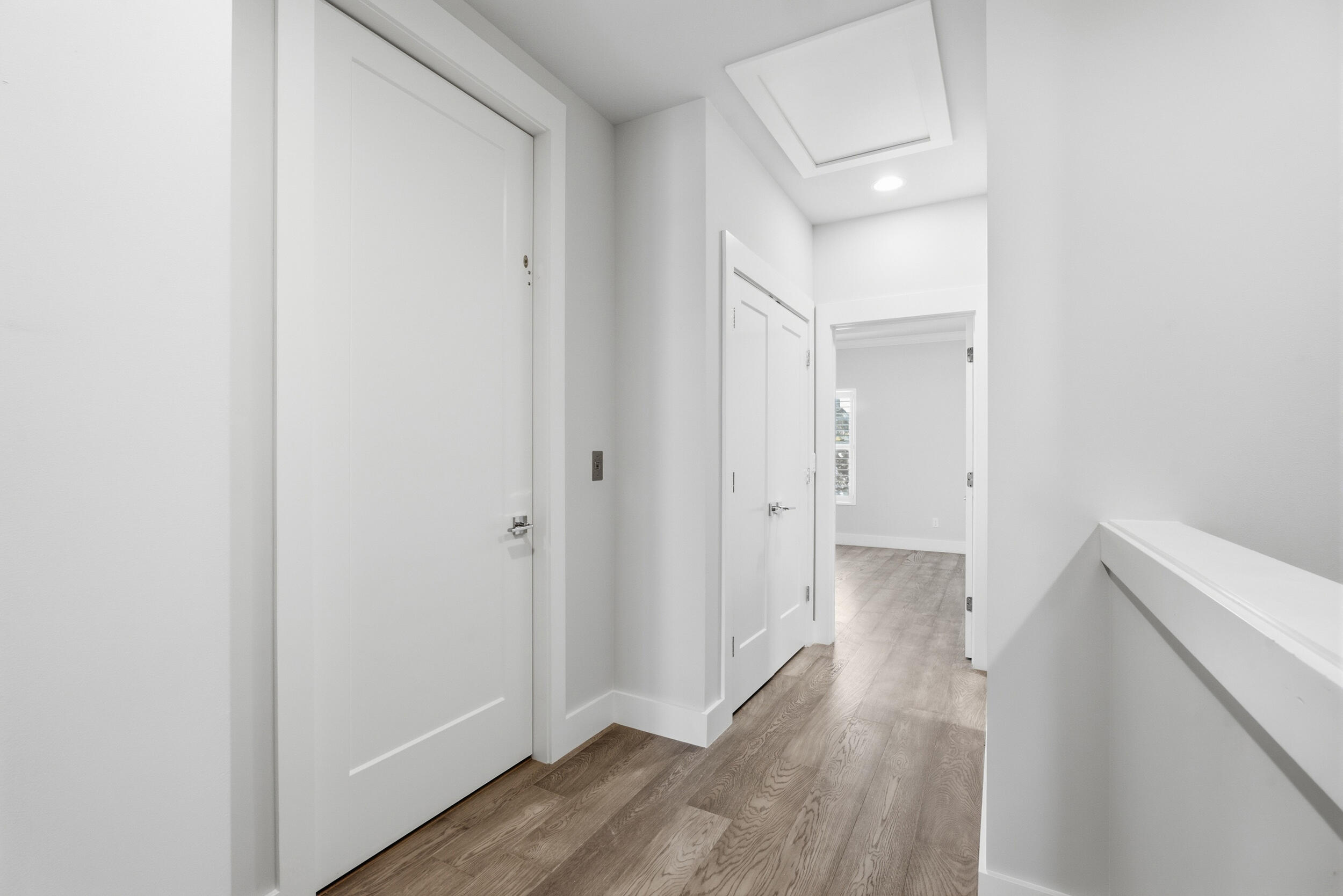 Elevator and entryway to primary bedroom