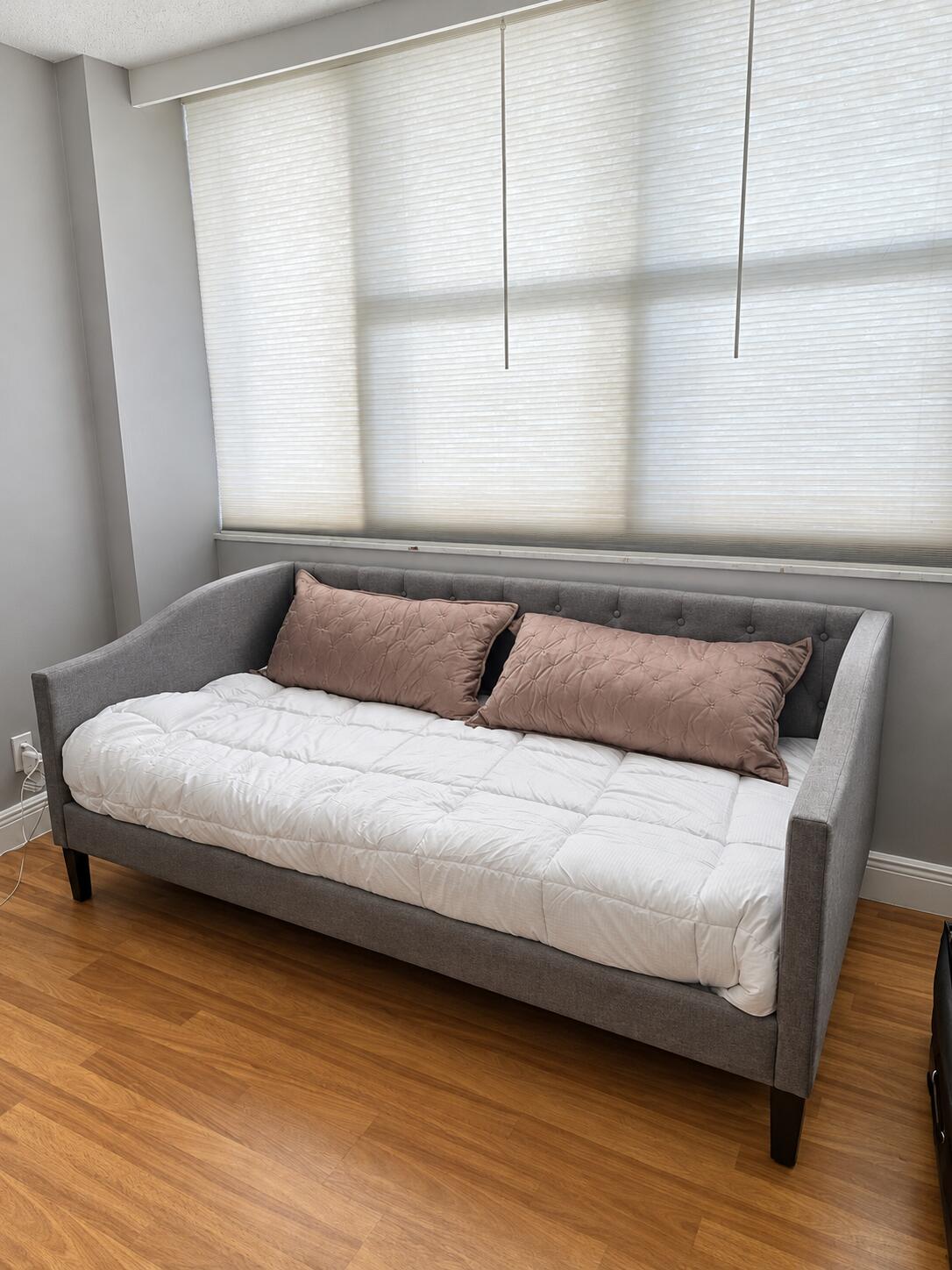 Minimal Gray Daybed Beneath Window