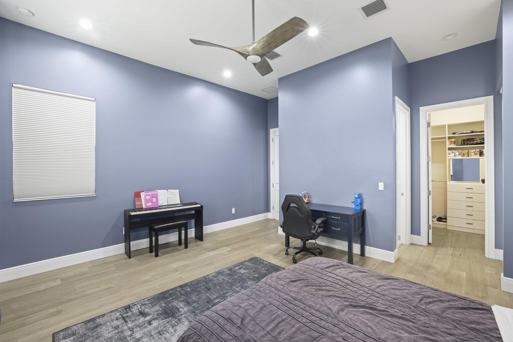 Recessed lighting, wood-finish flooring, ceiling fan, and built-in closet organization