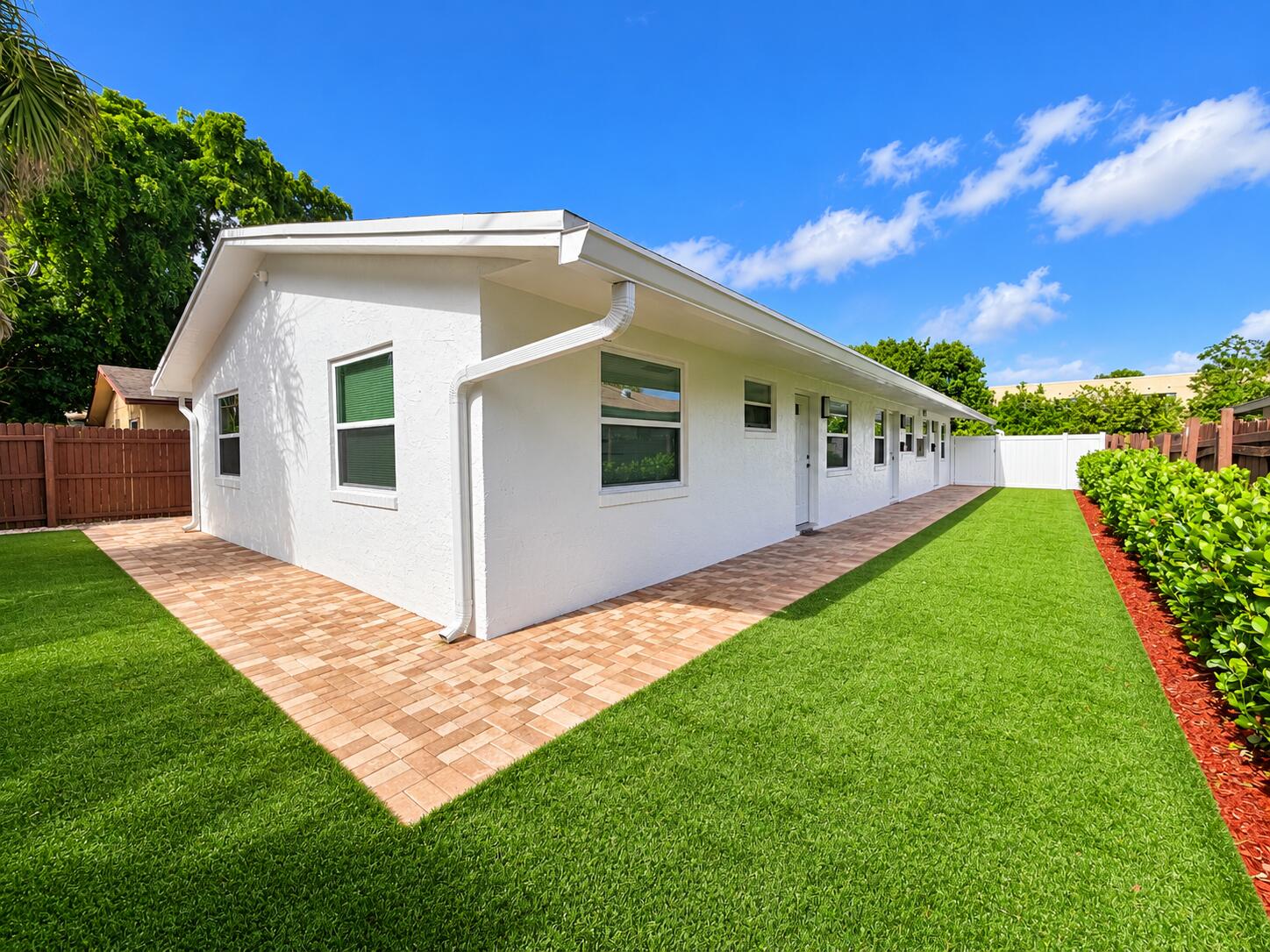 Modern House Side Yard with Lush Landsca