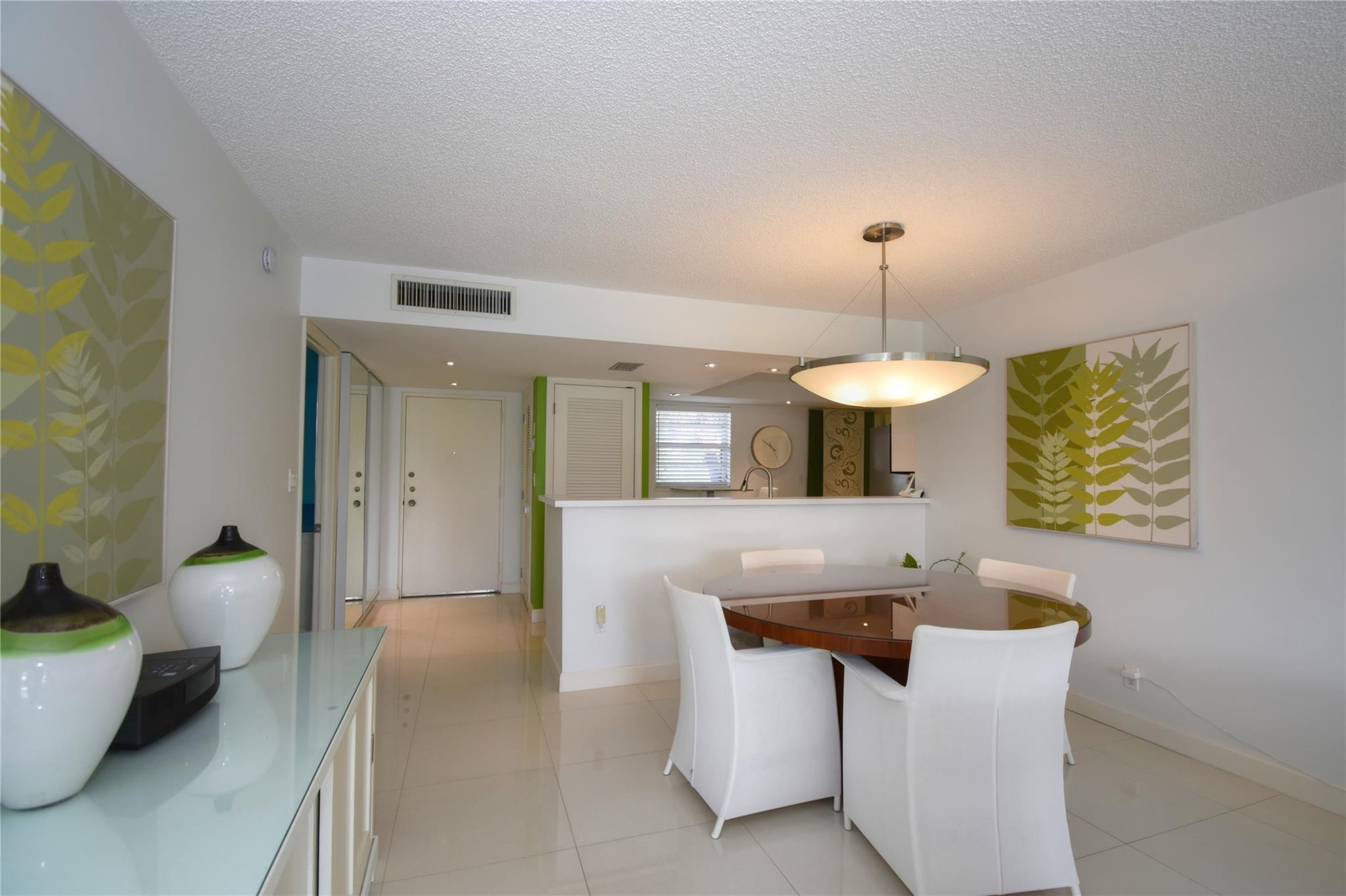 Kitchen opens to Living room