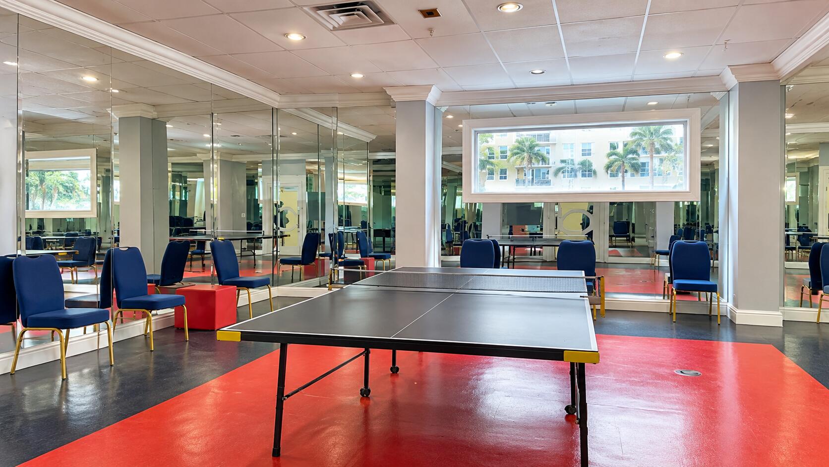Mirrored Recreation Room with Ping-Pong