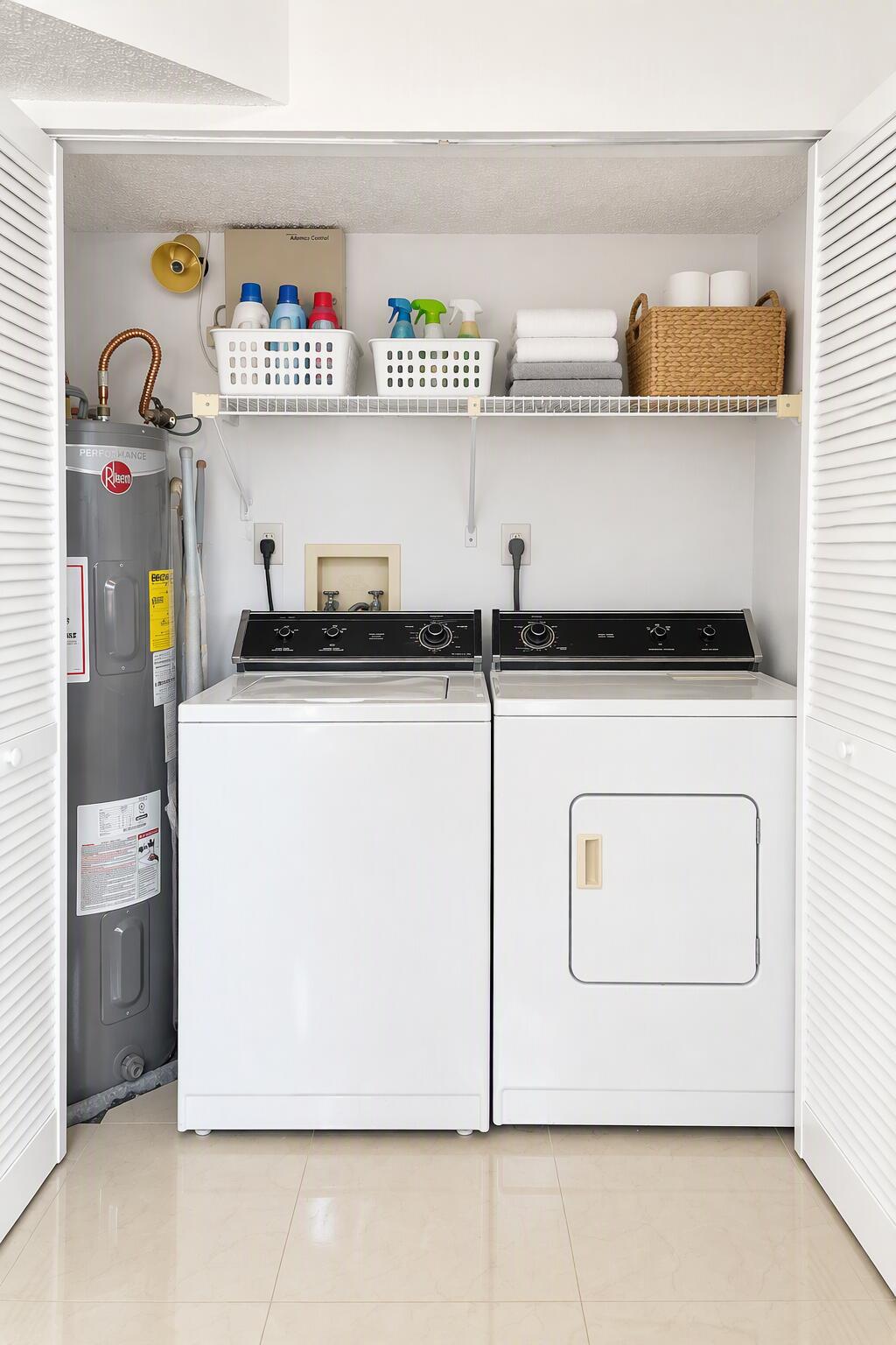 Utility closet featuring white bifold louvered doors, wire shelving, and a dedicated water heater