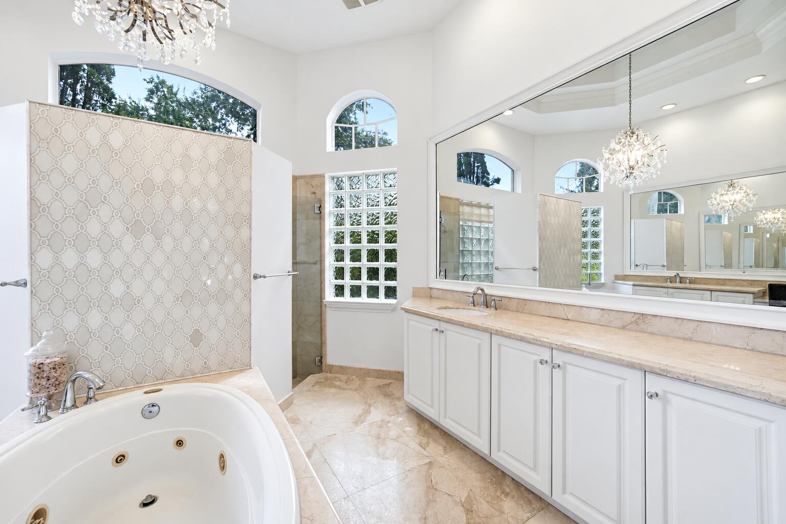 Luxury Bathroom with Arched Windows