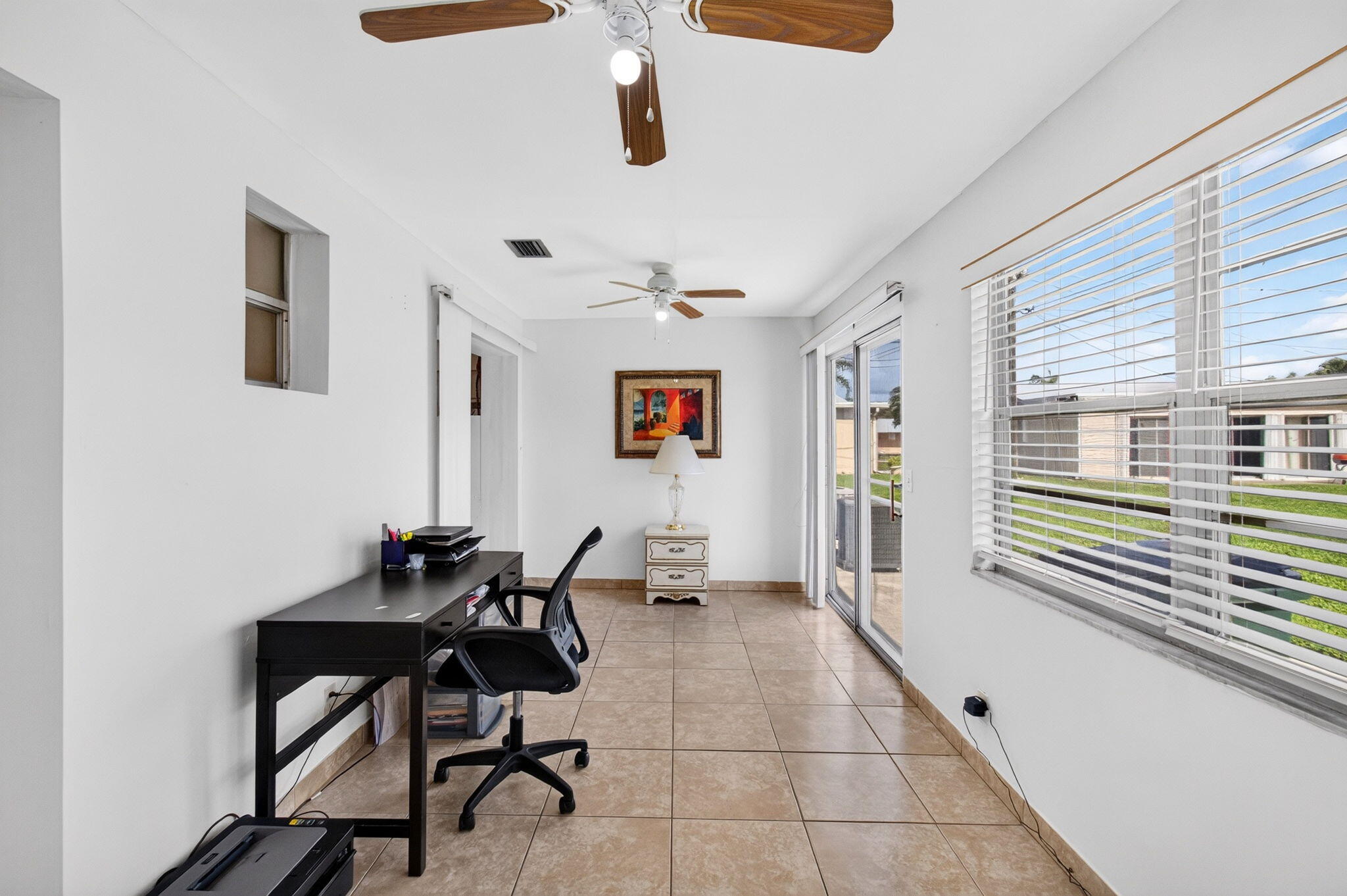 Enclosed patio - enlarged sqft compared to what is shown.