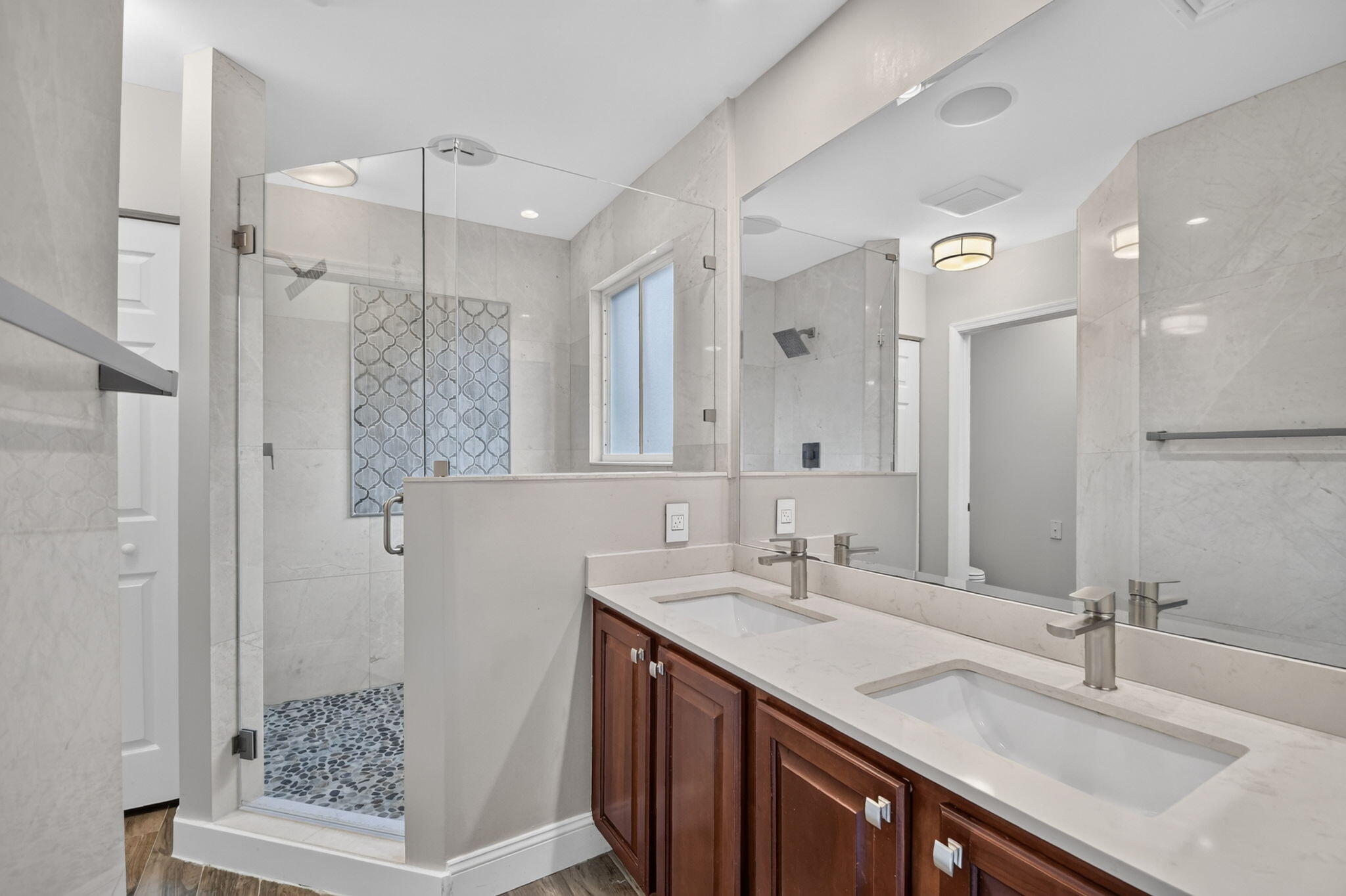 River rock shower floor and built in shelving. Ceiling speakers wired to head unit. (Not shown)