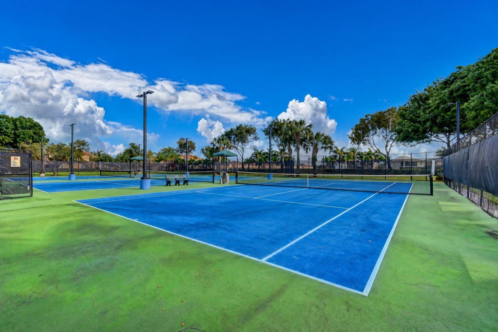 Three tennis courts and pickle ball court