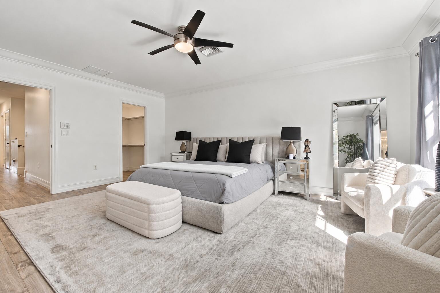 Tidy bedroom with an empty closet