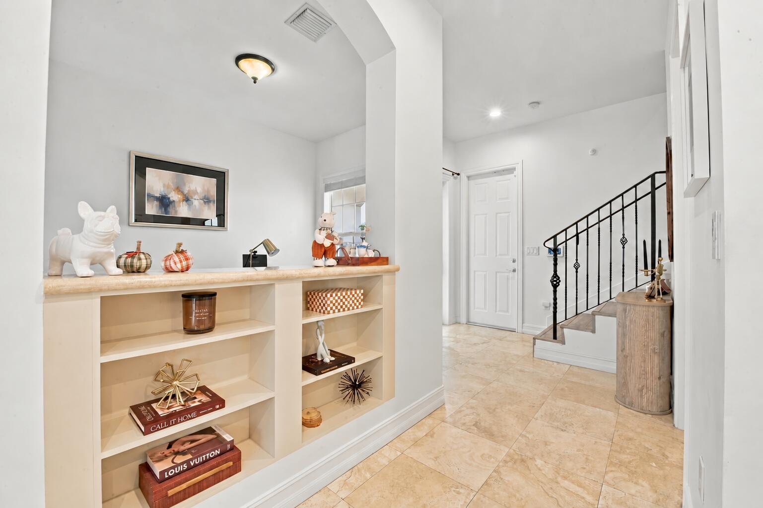 Contemporary abstract art above built-in