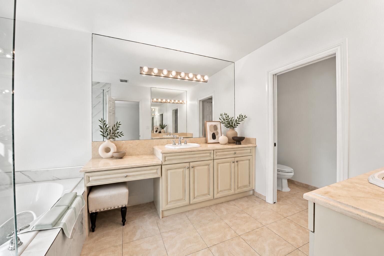 Primary bathroom with sculptural accents