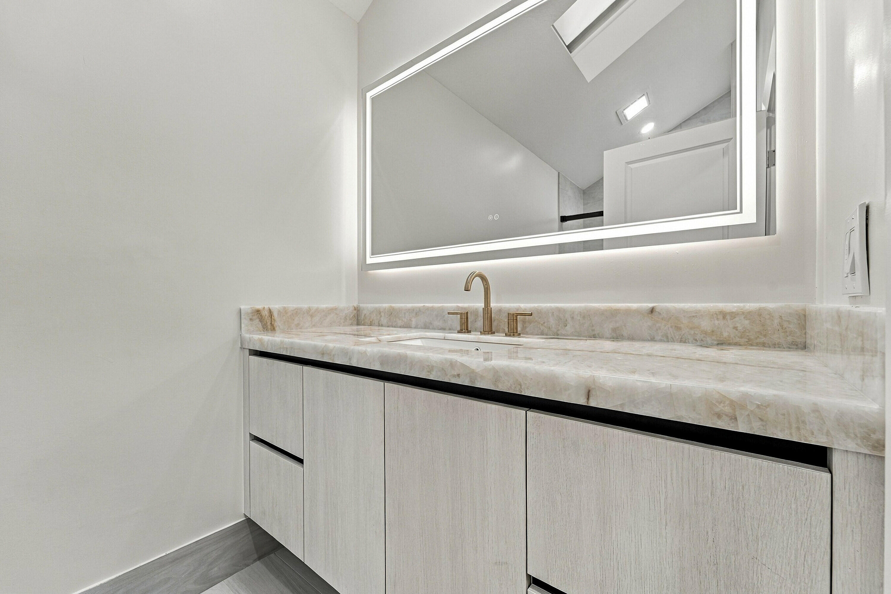 guest bathroom - beautiful gold accents