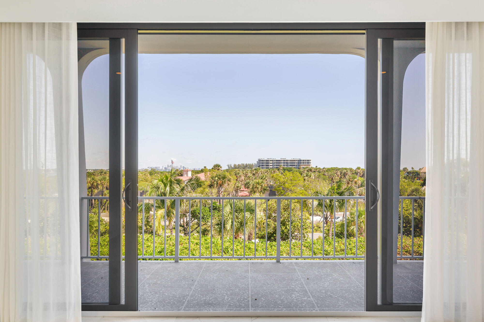 Gorgeous North facing view overlooking Phipps Ocean Park so it will never be obstructed! Partial views of the ocean and intracoastal.