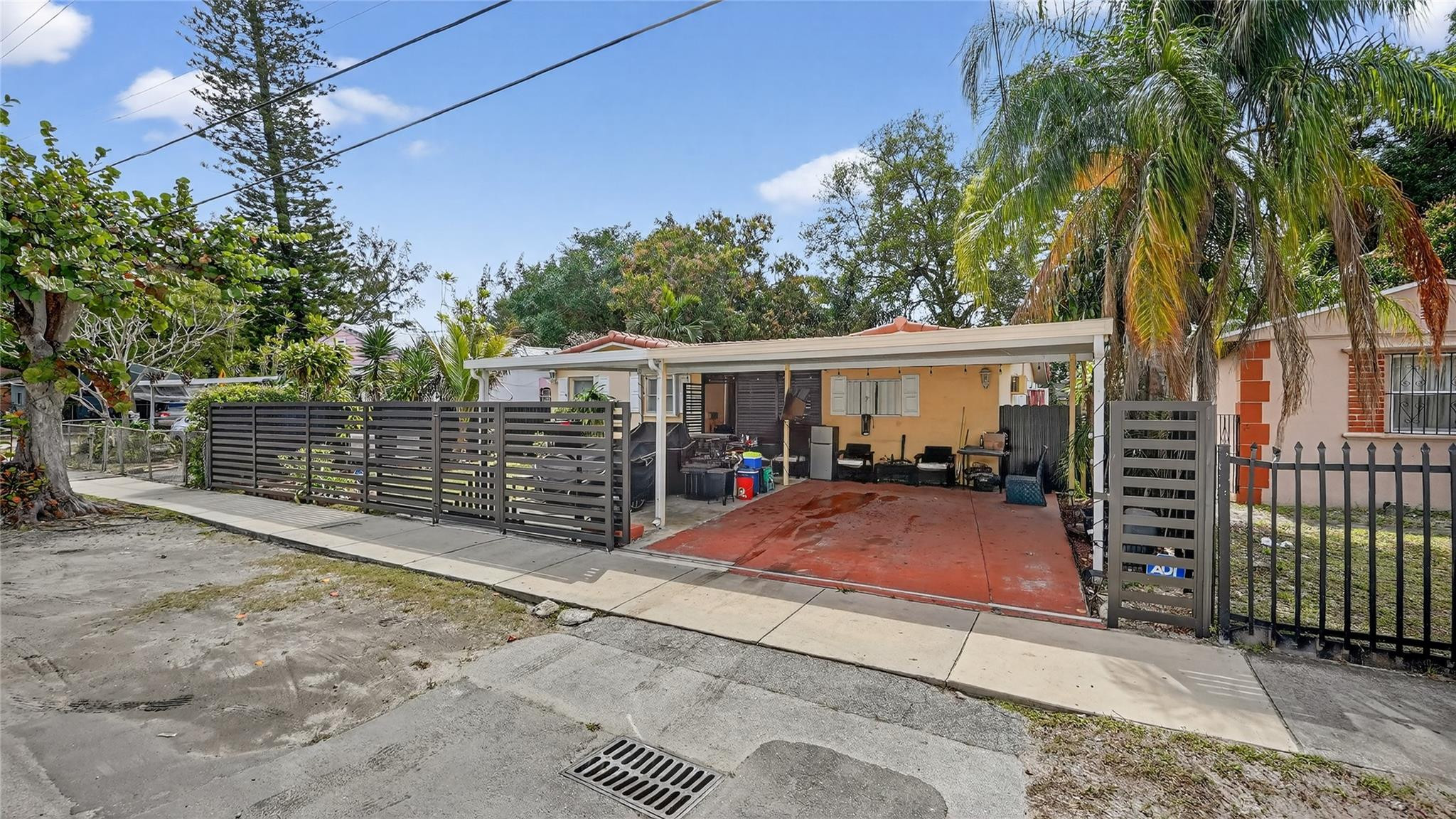 Showcasing gate and carport