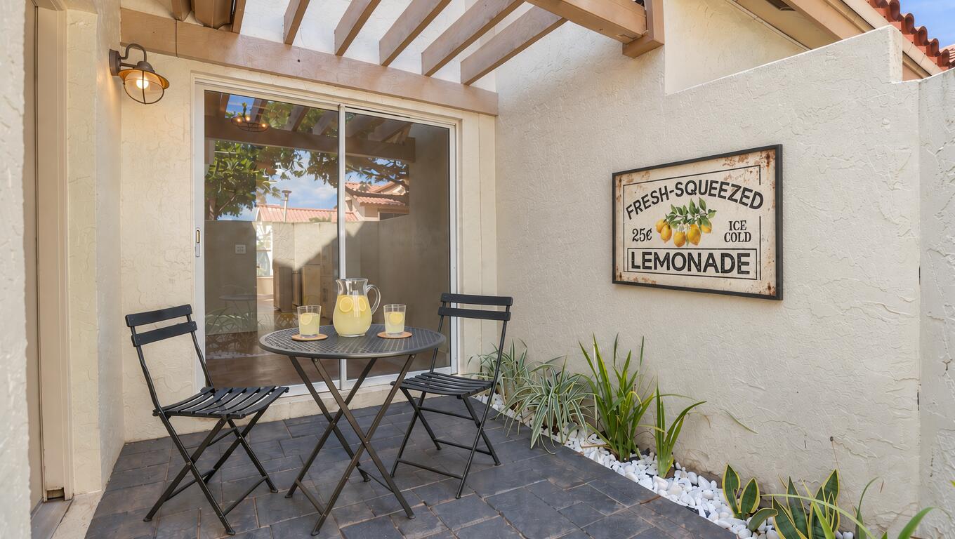 Side Patio off Dining Room. AI-Generated virtually staged