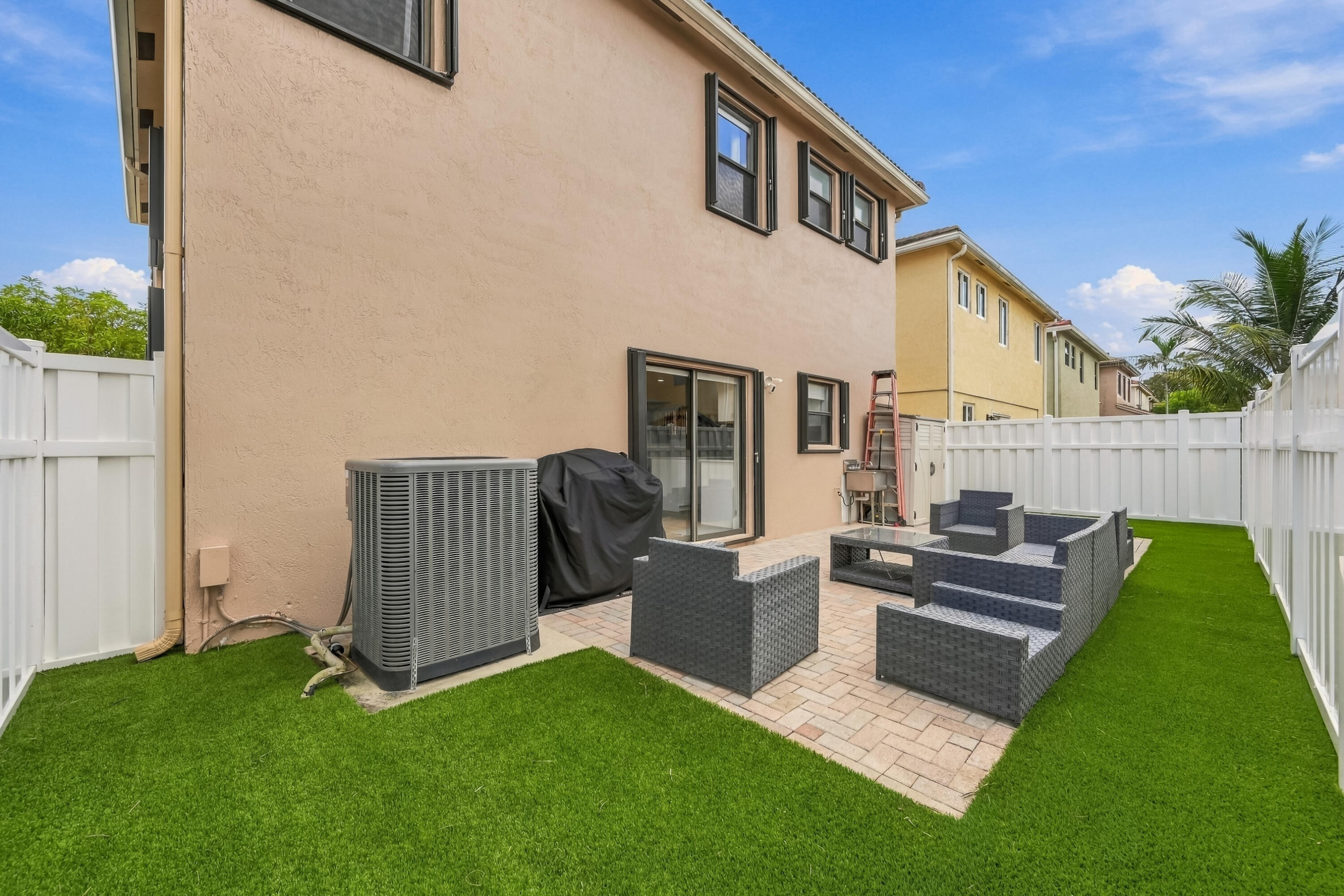 Turf all around this backyard and new 7ft fence for privacy.