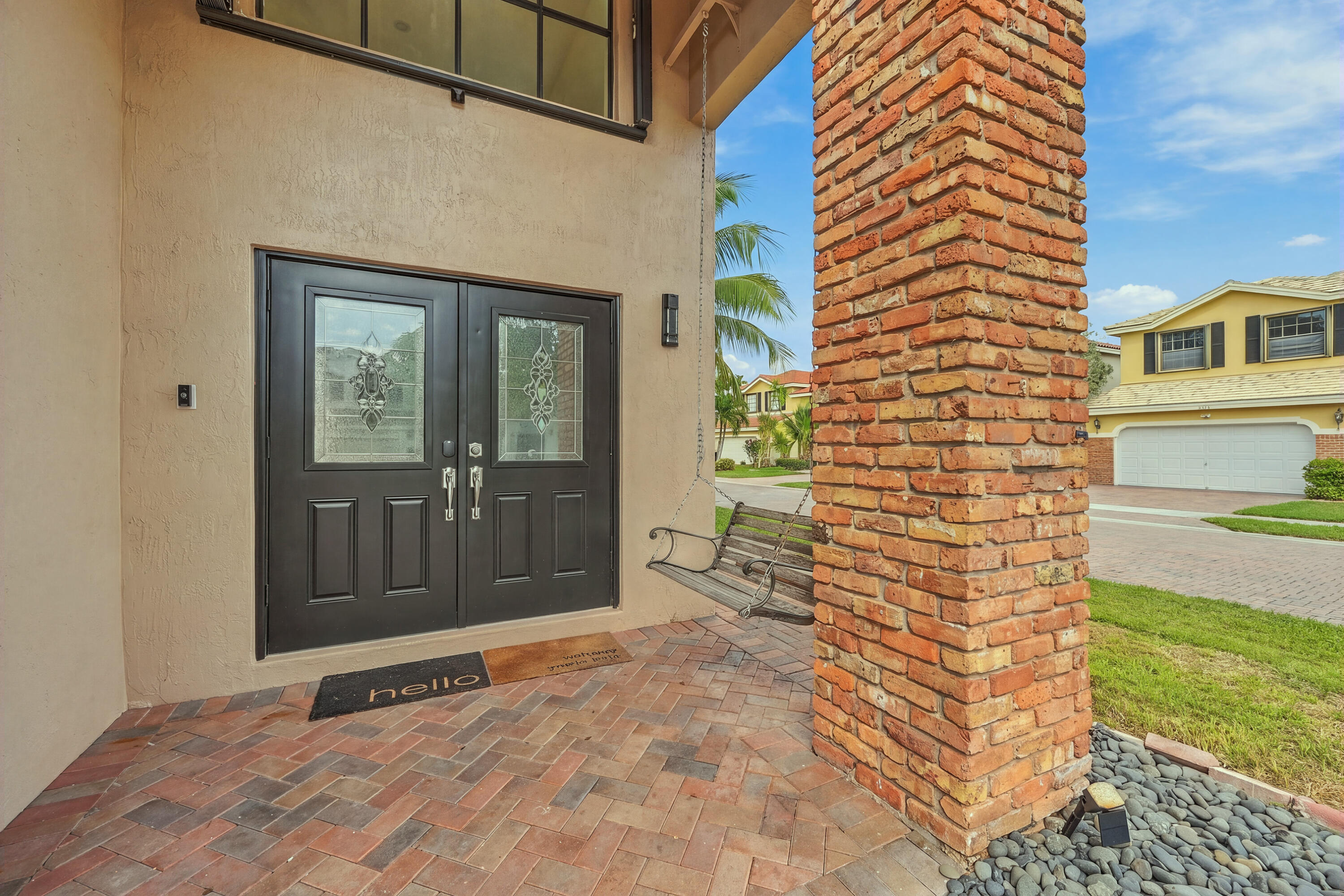 Double door entry with covered area. Double door entry with covered area.