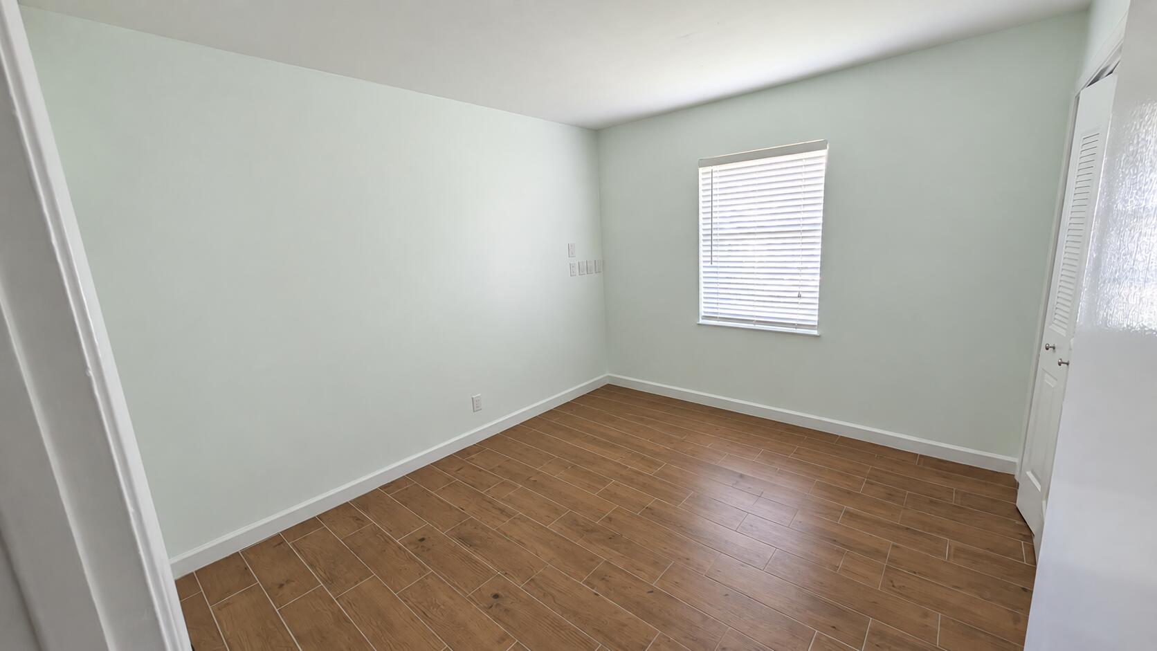 Bright Mint Empty Room with Wood-Style F