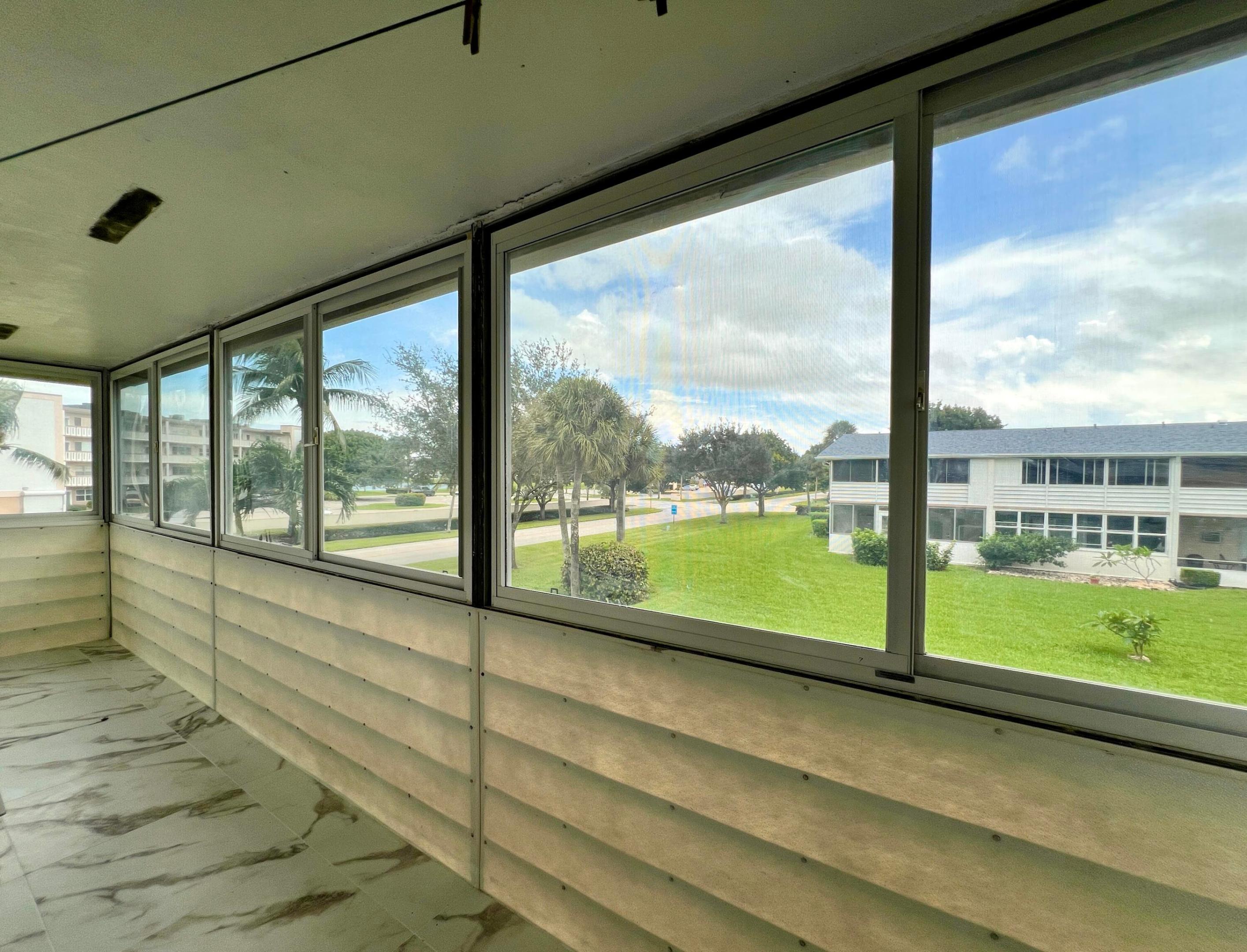 Long Lanai With Tile Flooring! CORNER 2/1.5 Condo In Fantastic Location!!!
