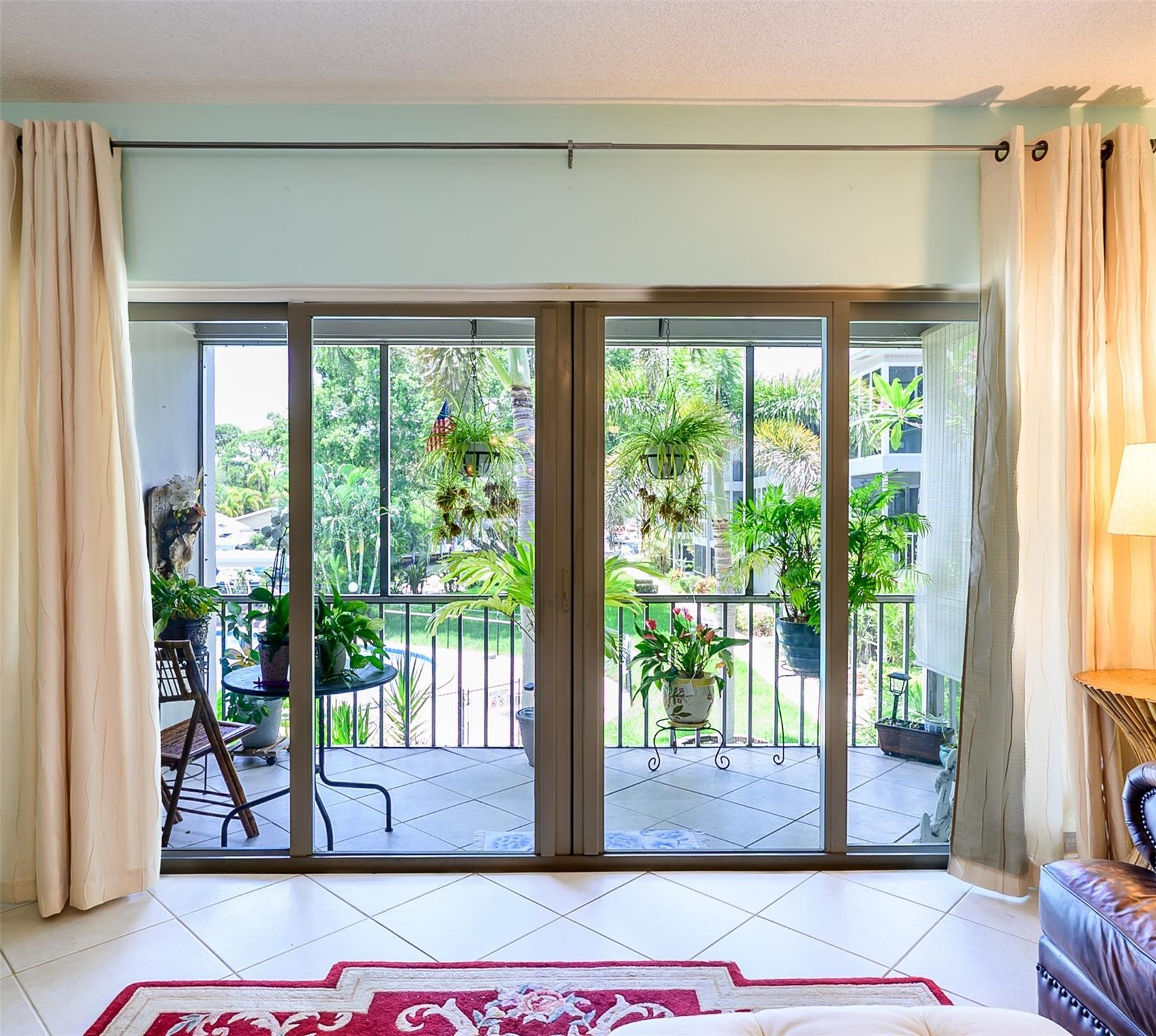 Impact Sliders to Screened Patio