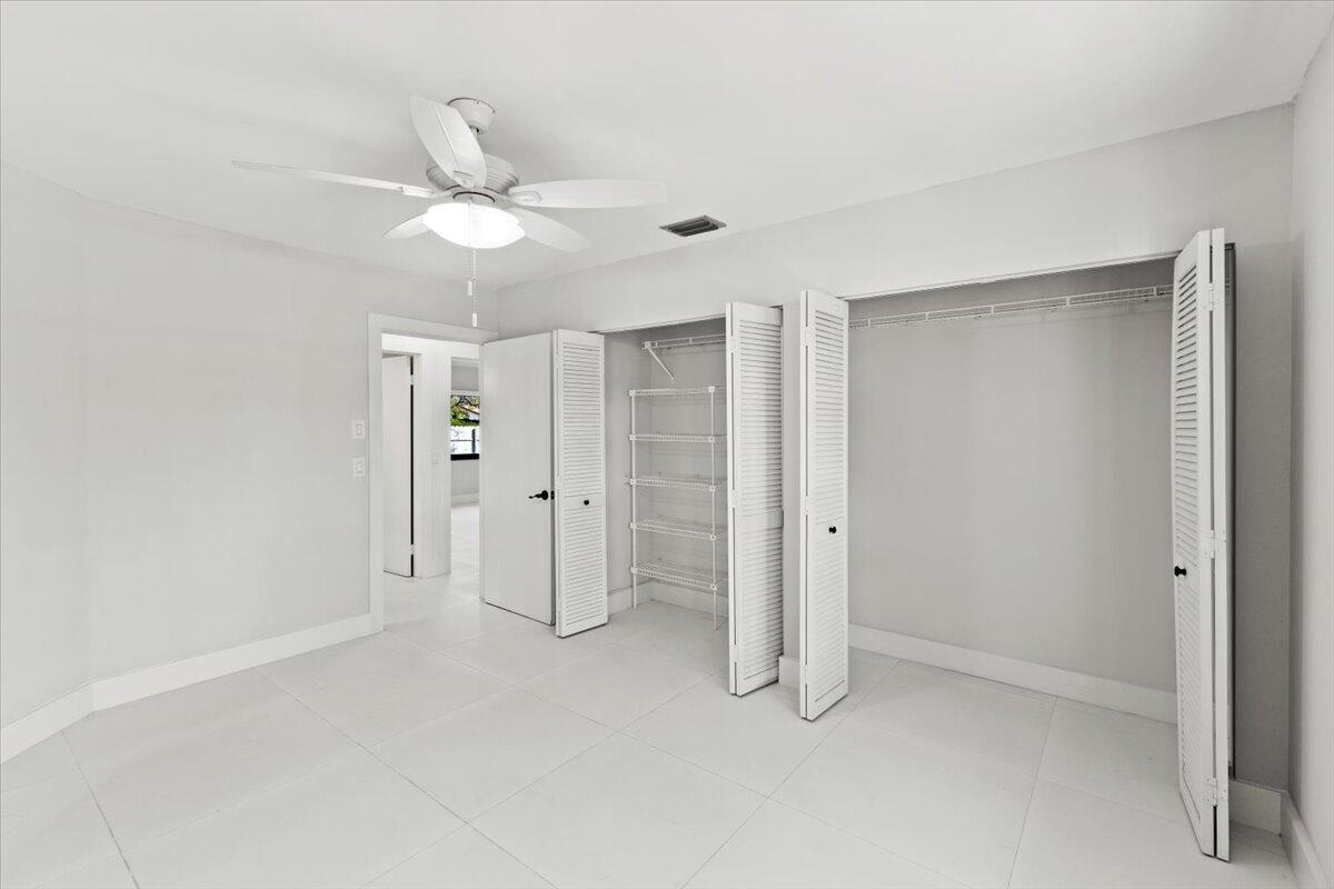 The second bedroom features dual closets.