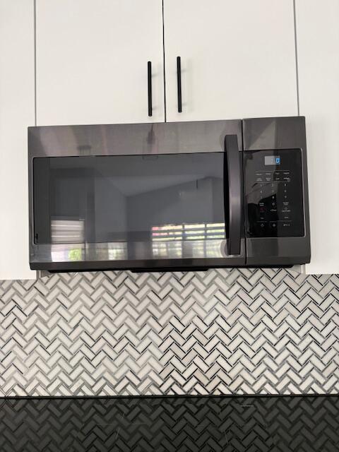 Microwave above the induction stove.