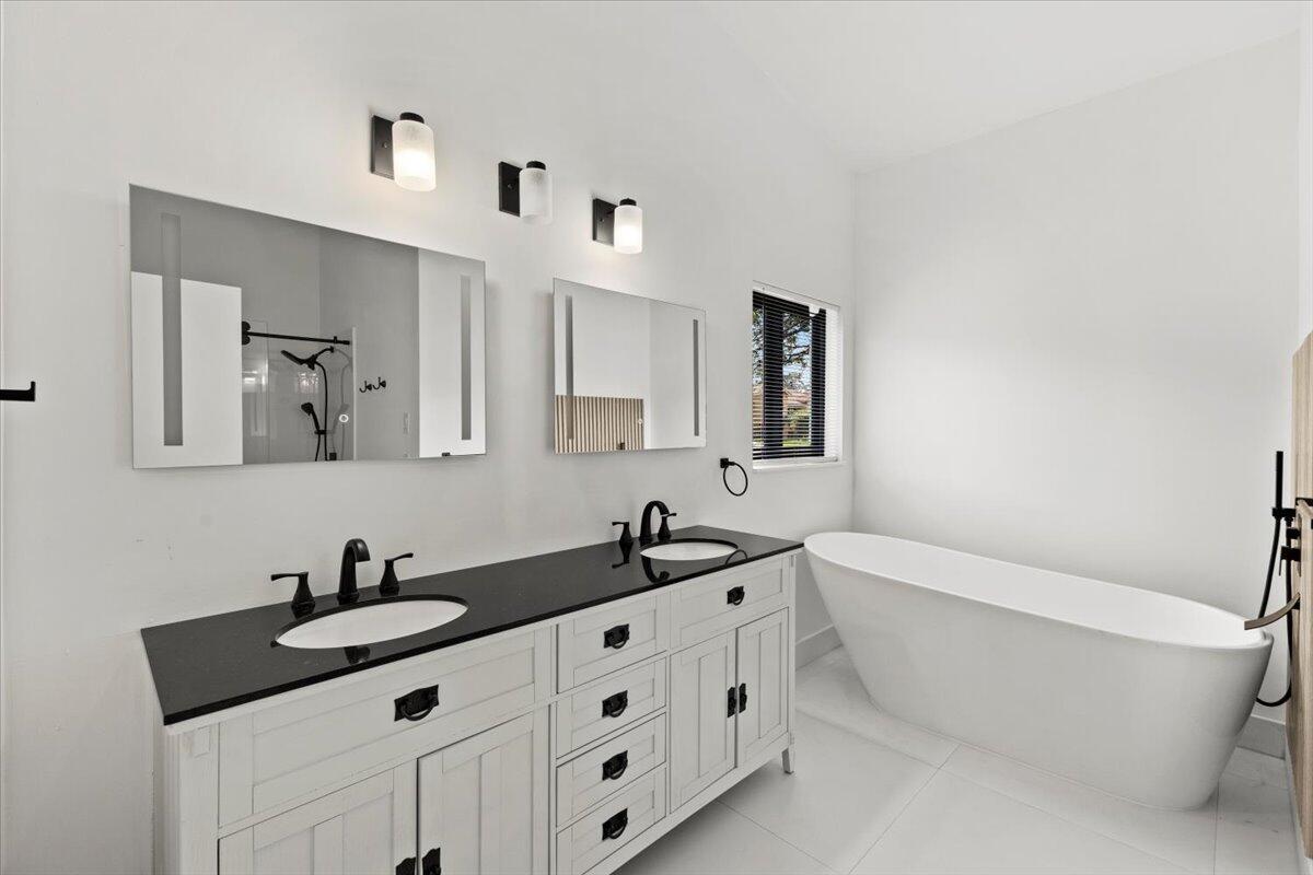 Touch-activated LED bathroom mirror lighting. In Master bathroom.