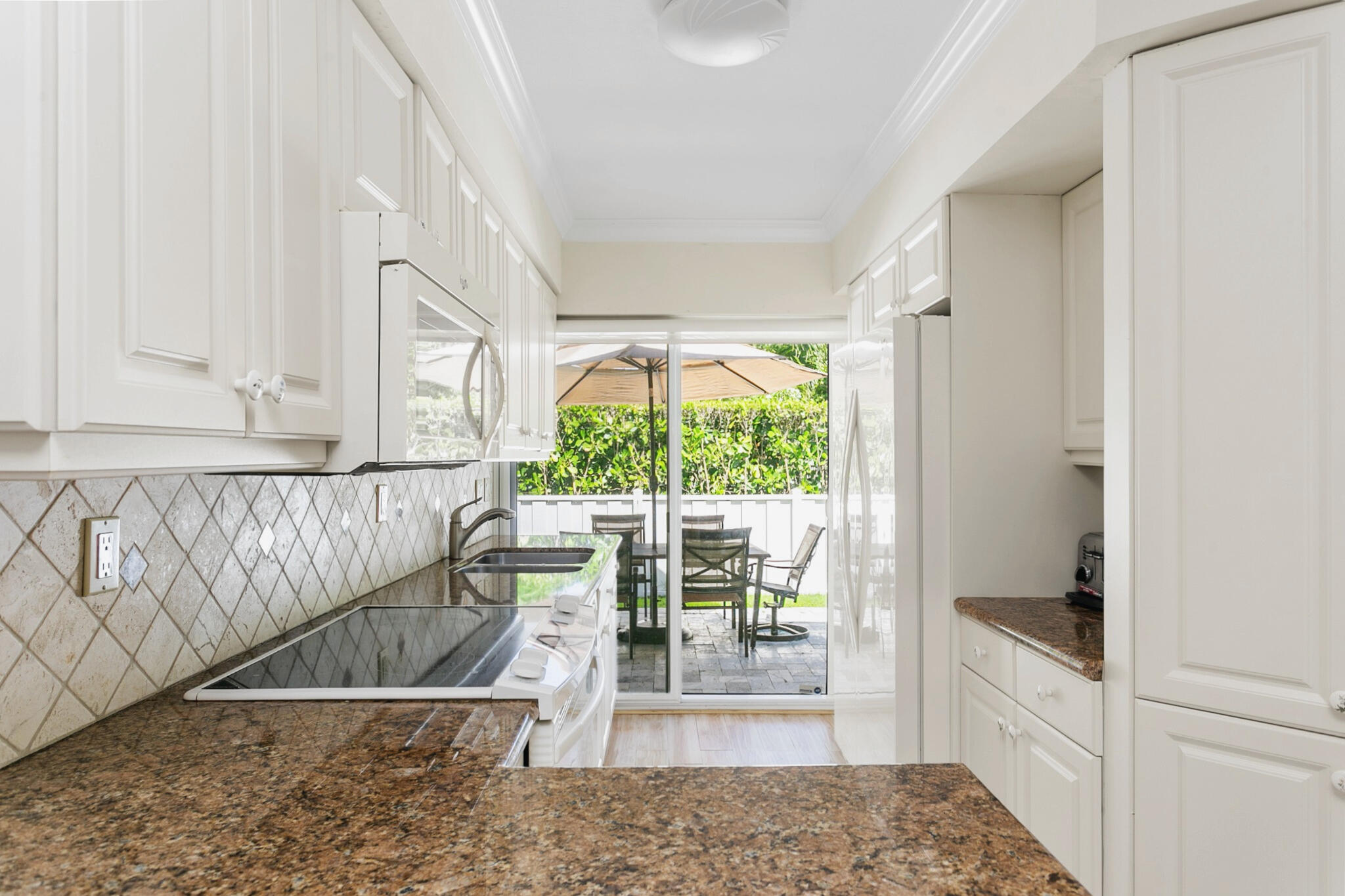 Kitchen featuring ample work space and separate coffee station
