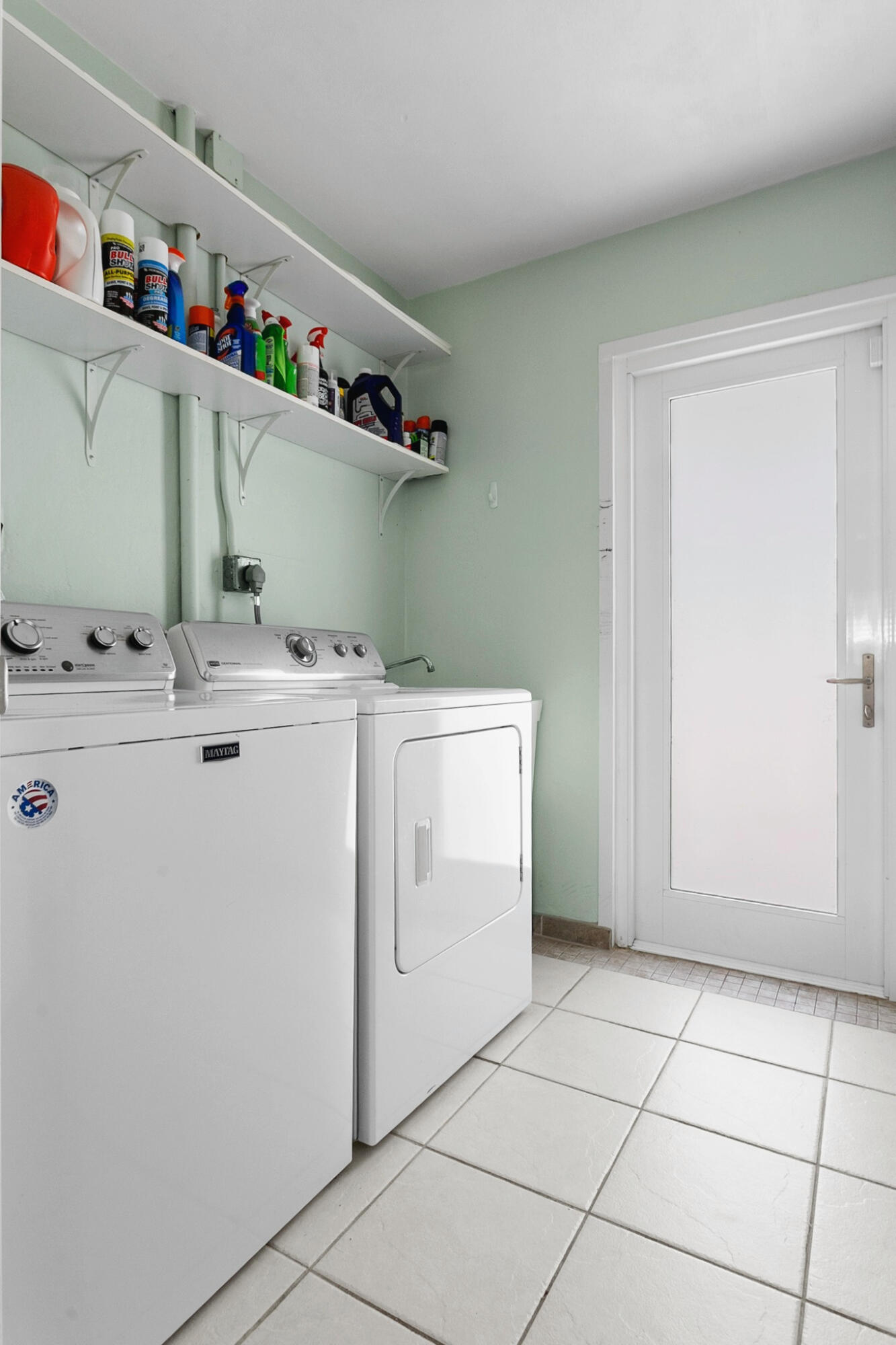 Extra large laundry and storage area with direct access to outside