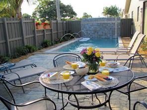 Pool and patio shared by three apartments.