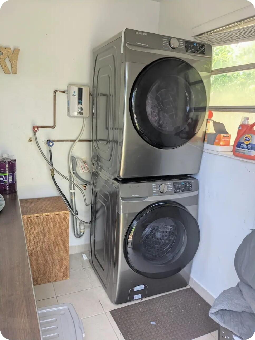 Washer dryer right next door in separate locked laundry room. Full sized appliances. No charge for residents.