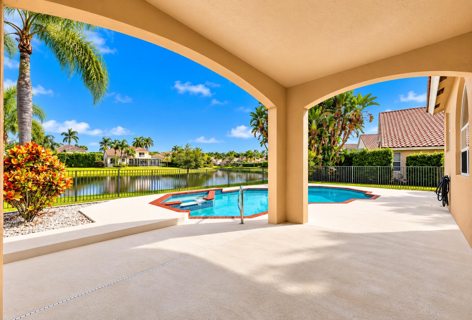 This is what South Florida living is all about! A beautiful private pool, inviting spa, tropical surroundings, and stunning waterfront views combine to create an extraordinary backyard experience.