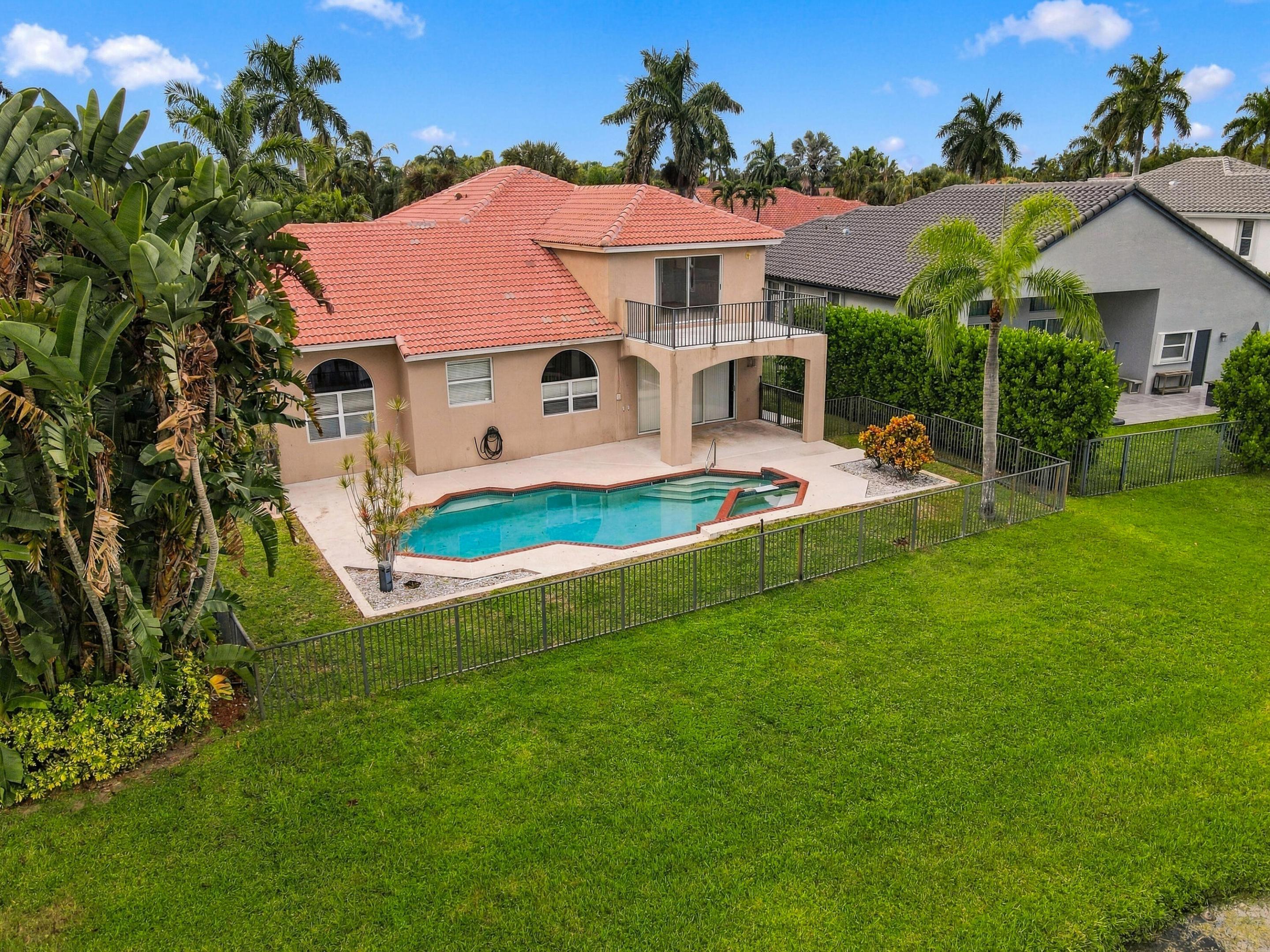 An incredible outdoor retreat! The expansive pool deck, covered patio, and private pool and spa offer endless opportunities for entertaining or simply enjoying your own slice of paradise.