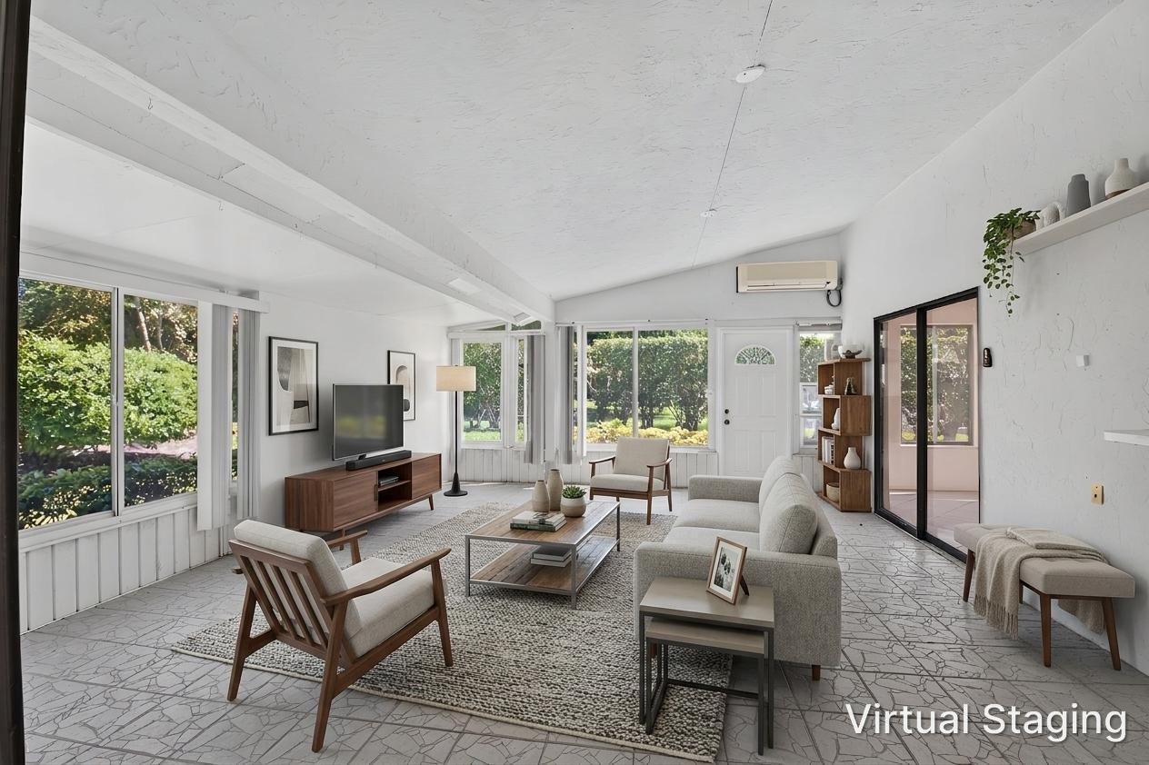 This enclosed Florida room is an extension of your living space.