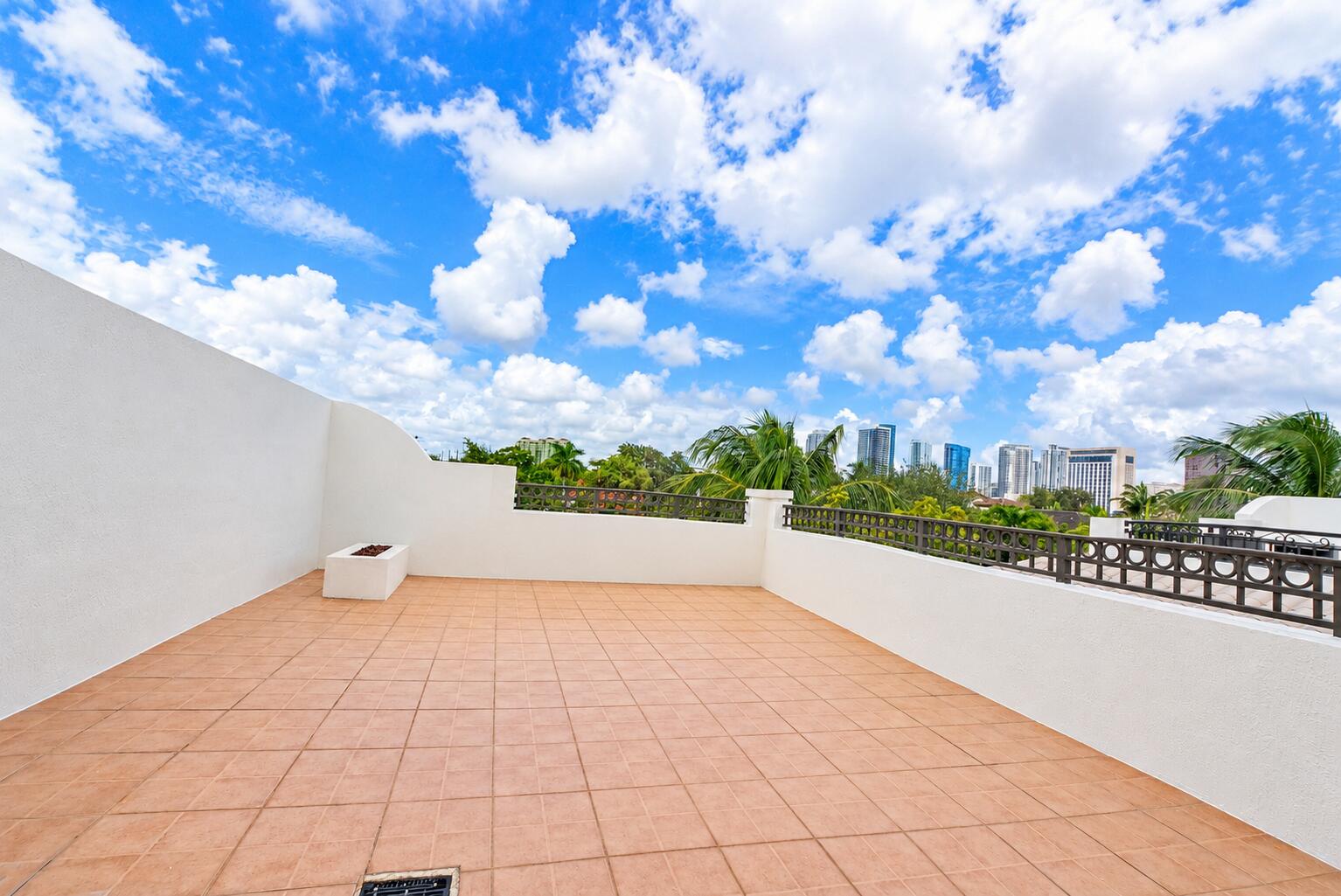 Sunny Rooftop Terrace Cityscape