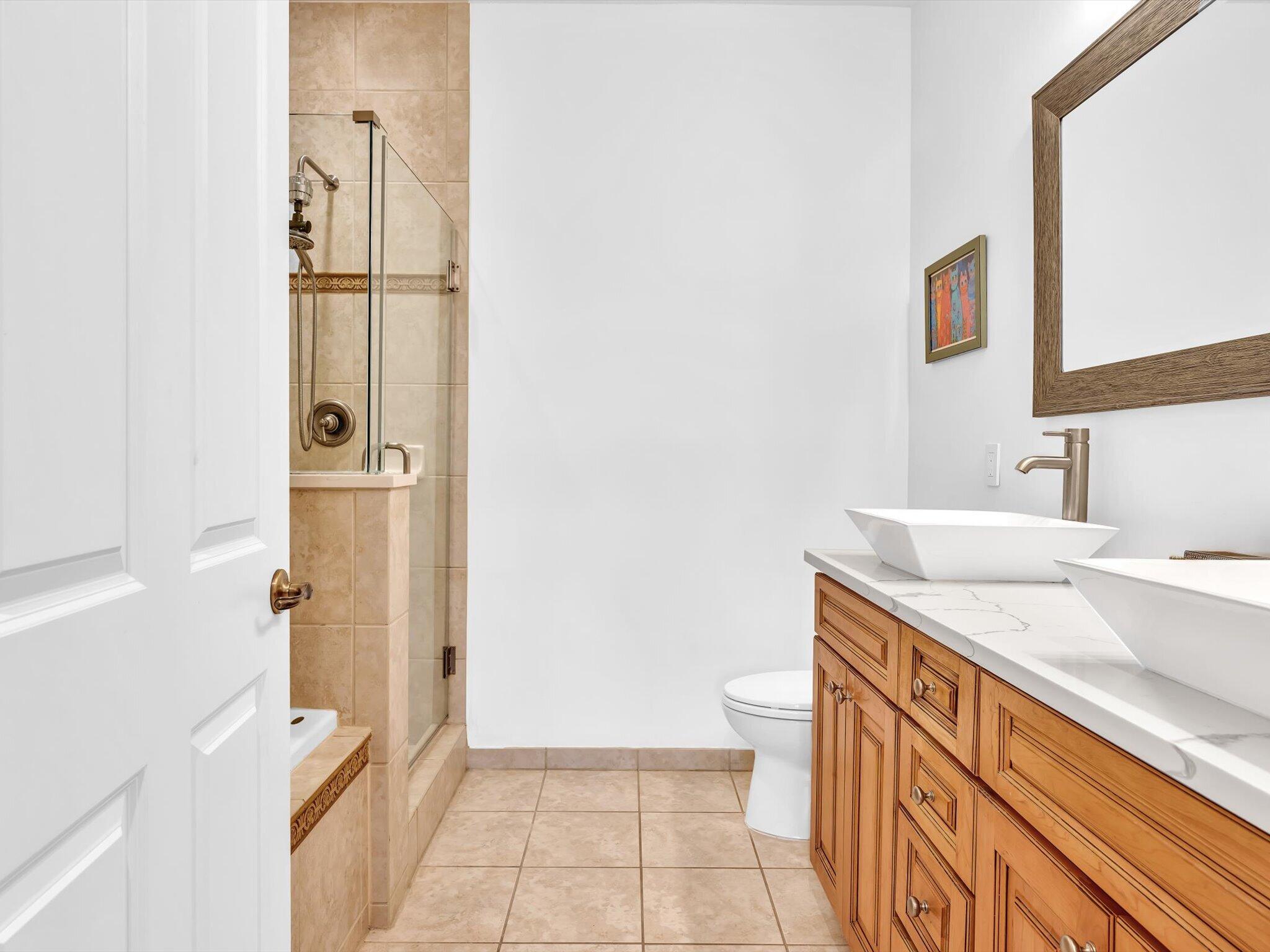 Primary Bathroom, 2 sinks separate tub and shower