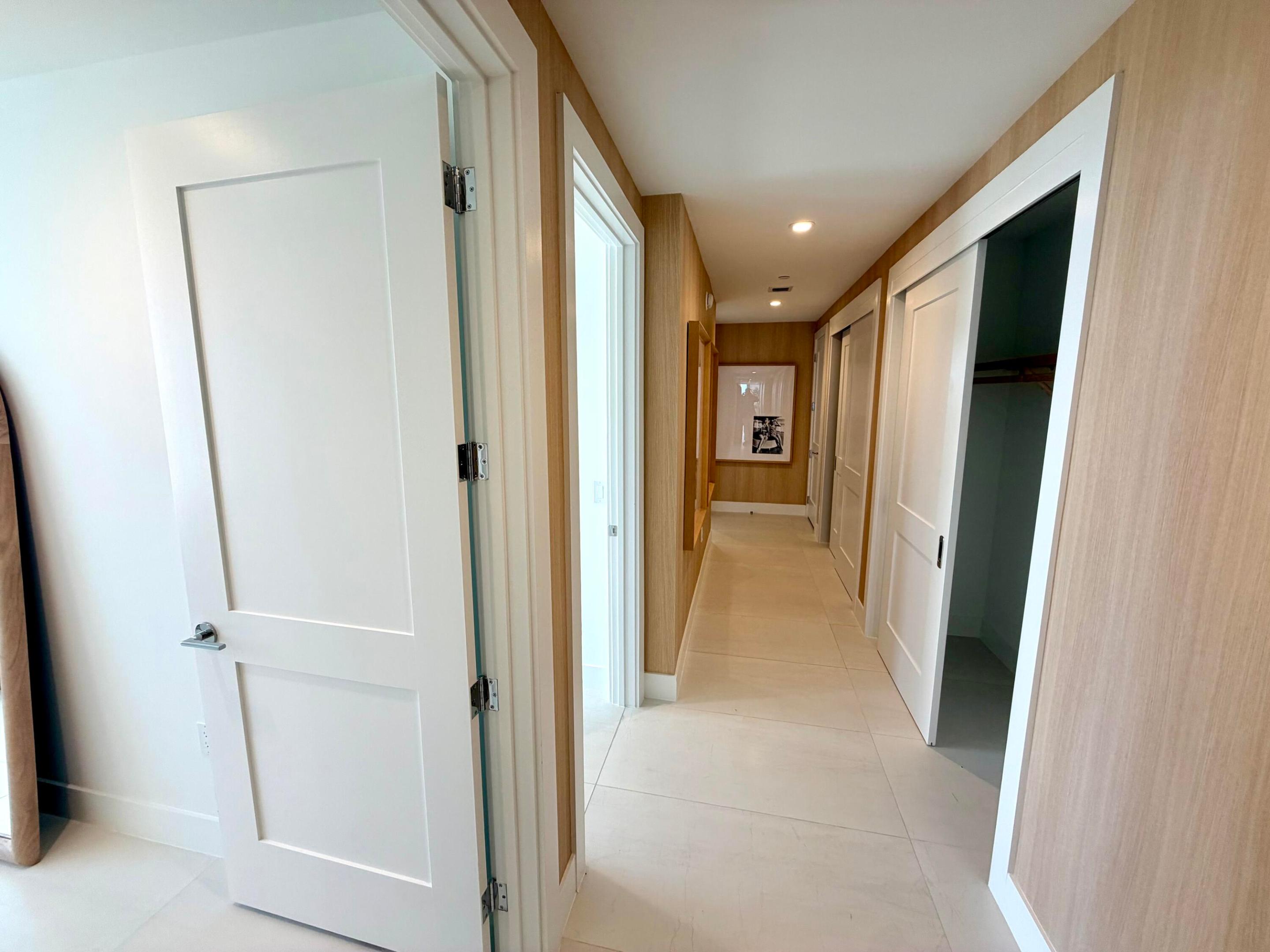 Hallway with extra storage closets