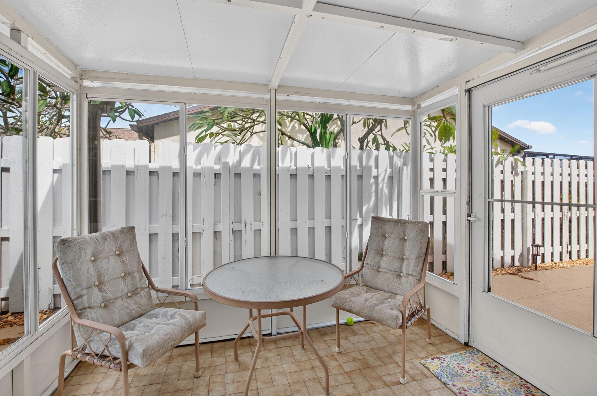 Private covered patio off the kitchen. Private covered patio off the kitchen.