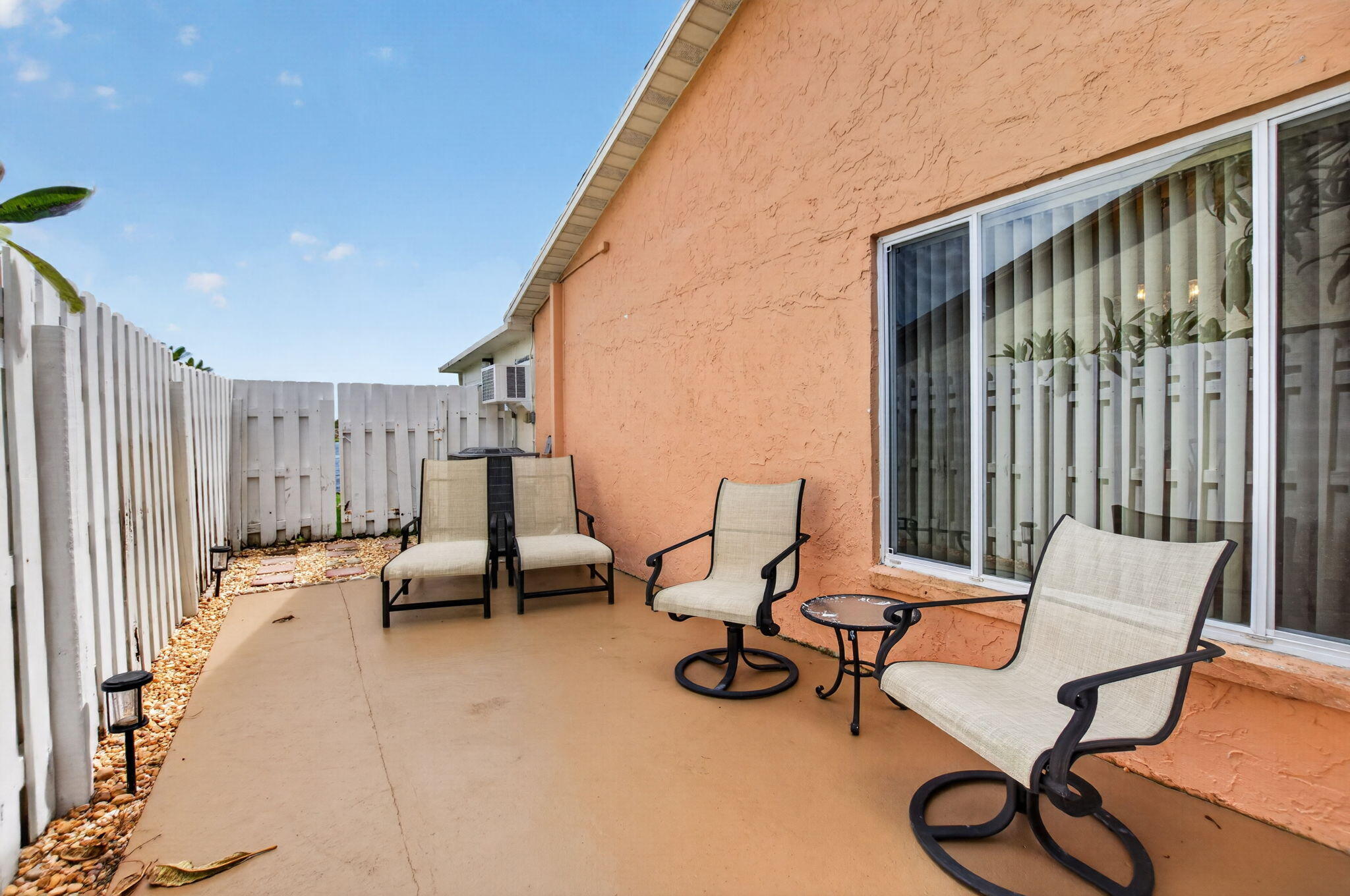 Large private side patio off the kitchen.