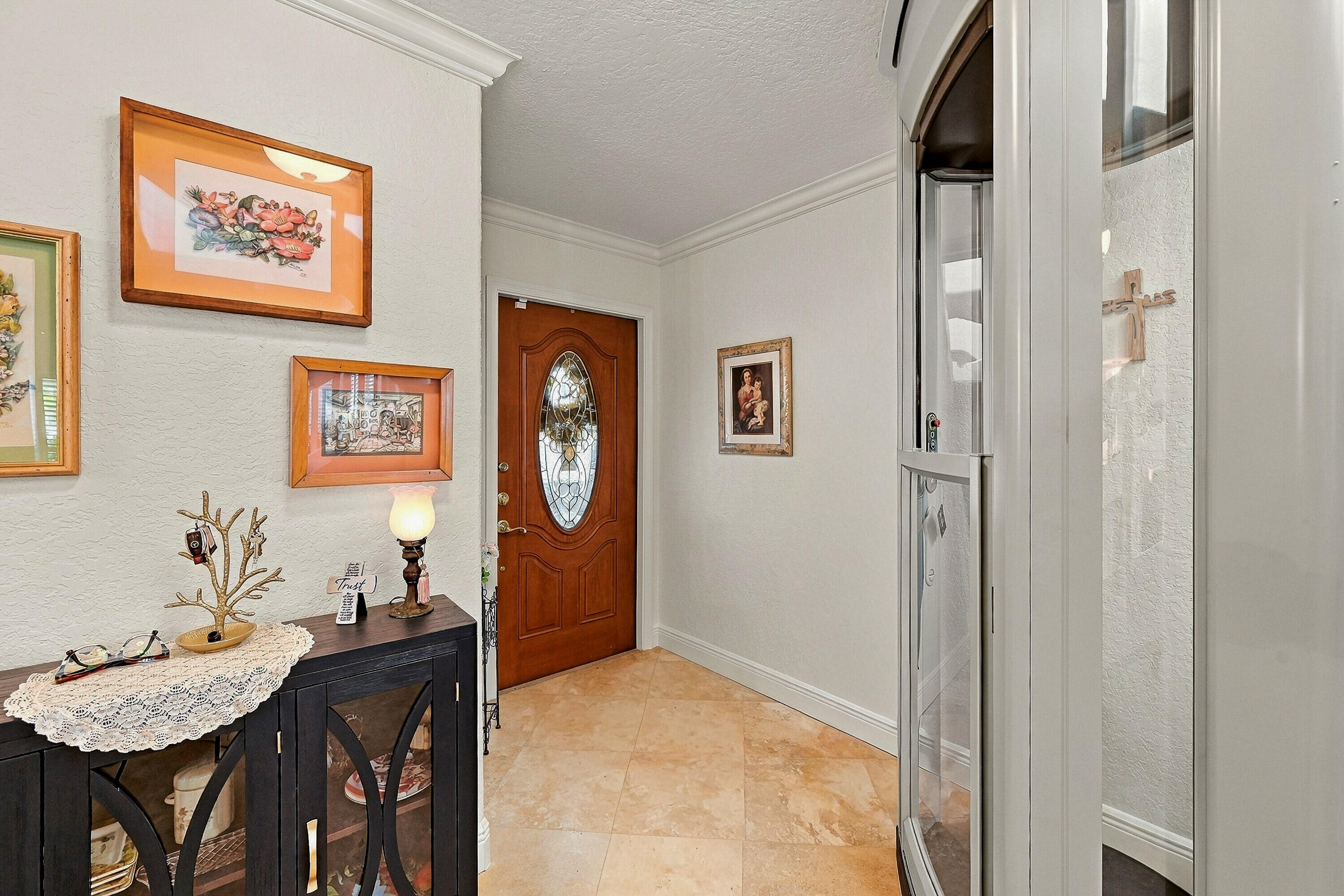 Elevator and entrance