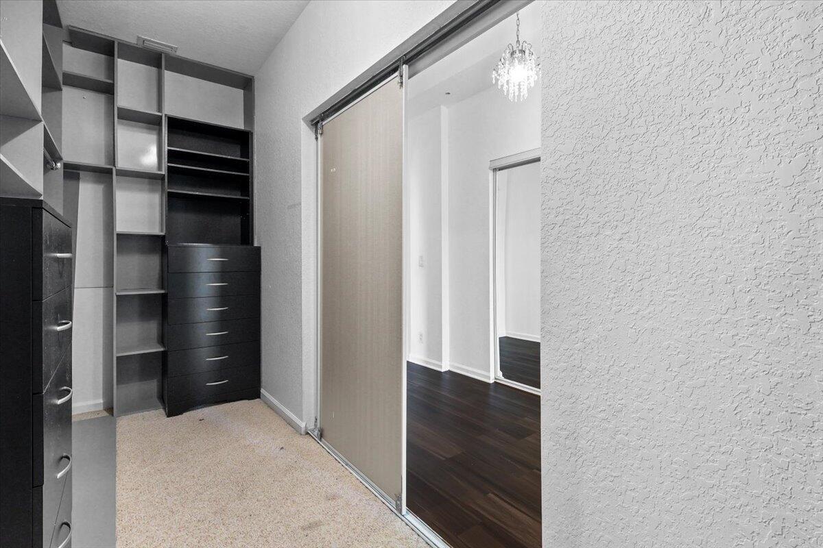 EN-SUITE WALK-IN CLOSET IN MAIN MASTER SUITE ON SECOND FLOOR