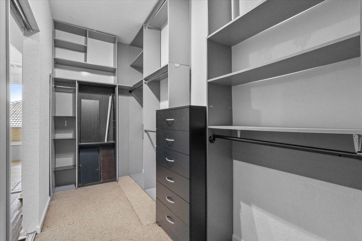 EN-SUITE WALK-IN CLOSET IN MAIN MASTER SUITE ON SECOND FLOOR
