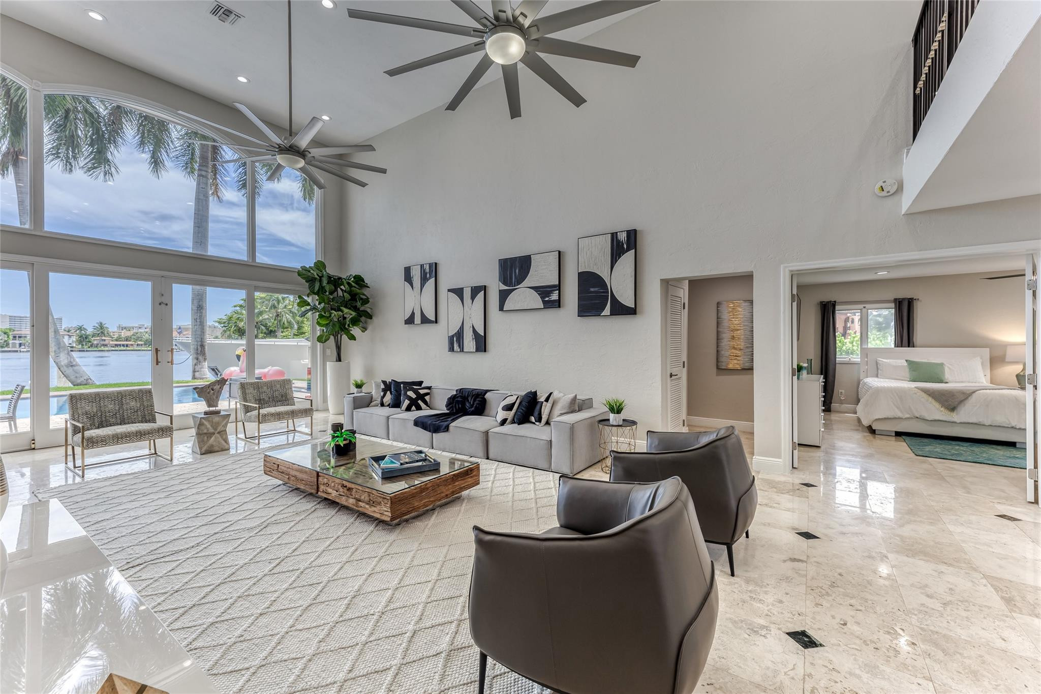 Open Layout Family Area overlooking Waterway & Pool Area