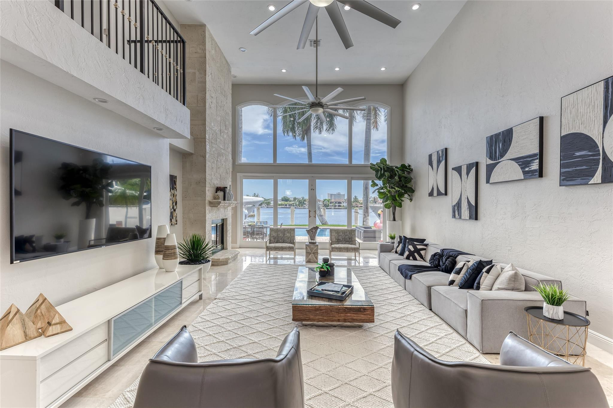 Open Layout Family Area overlooking Waterway & Pool Area