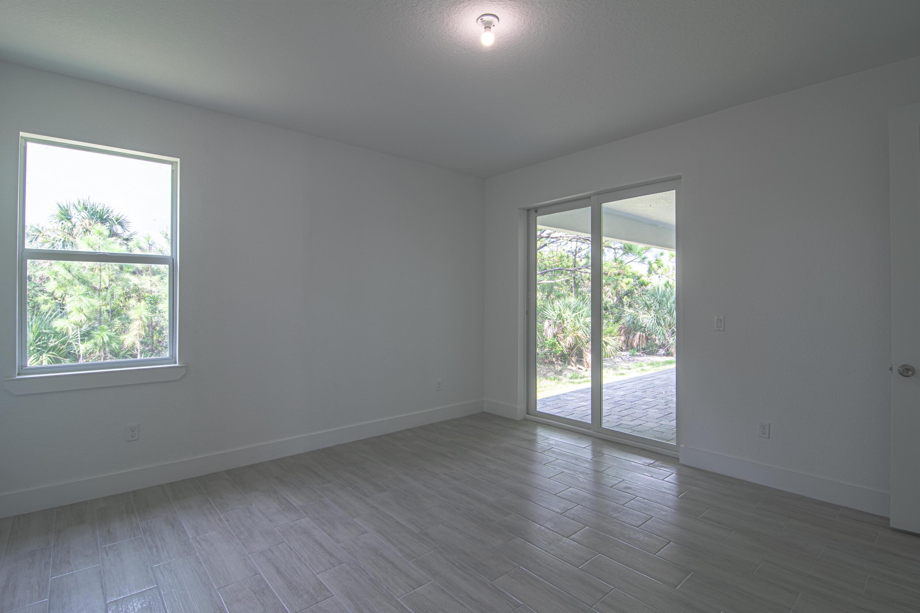 Bedroom with Patio Access