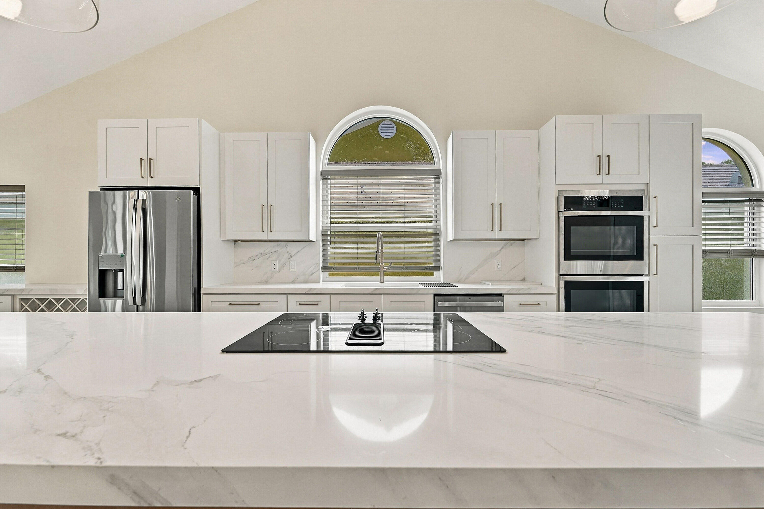 Oversized kitchen island for entertaining guests Oversized kitchen island for entertaining guests