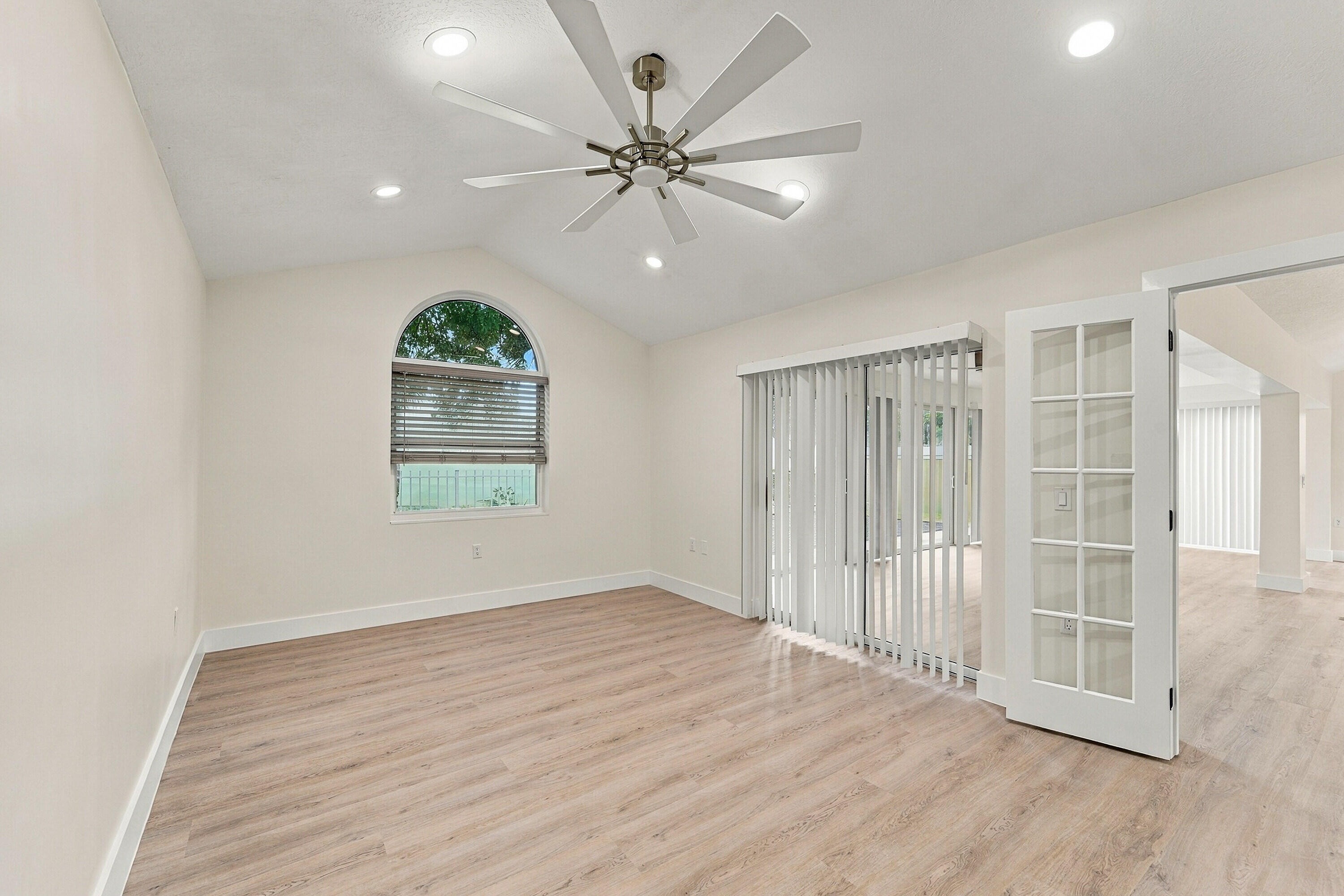 Primary bedroom with custom french doors